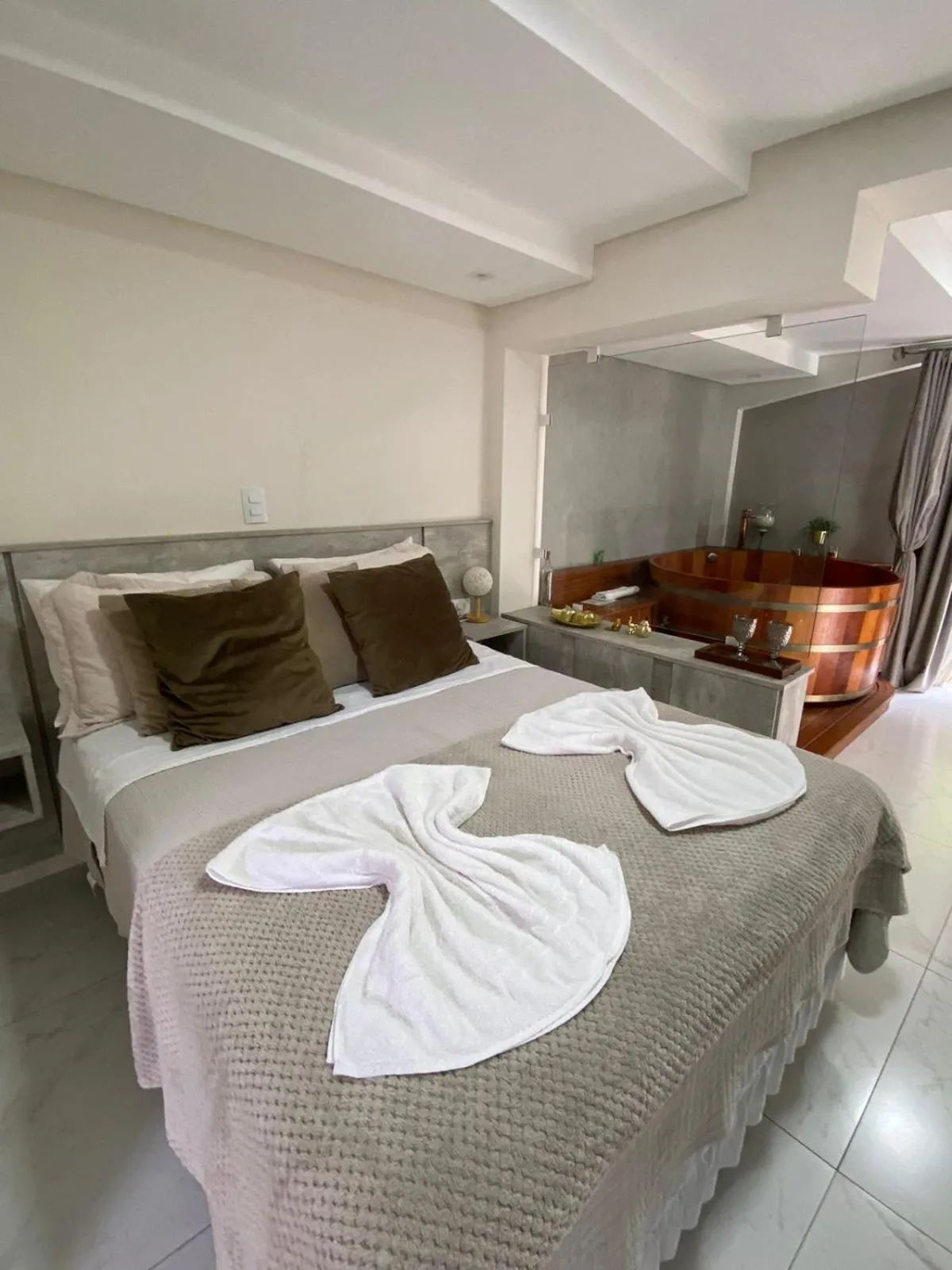 Bed in Bombinhas Guest House