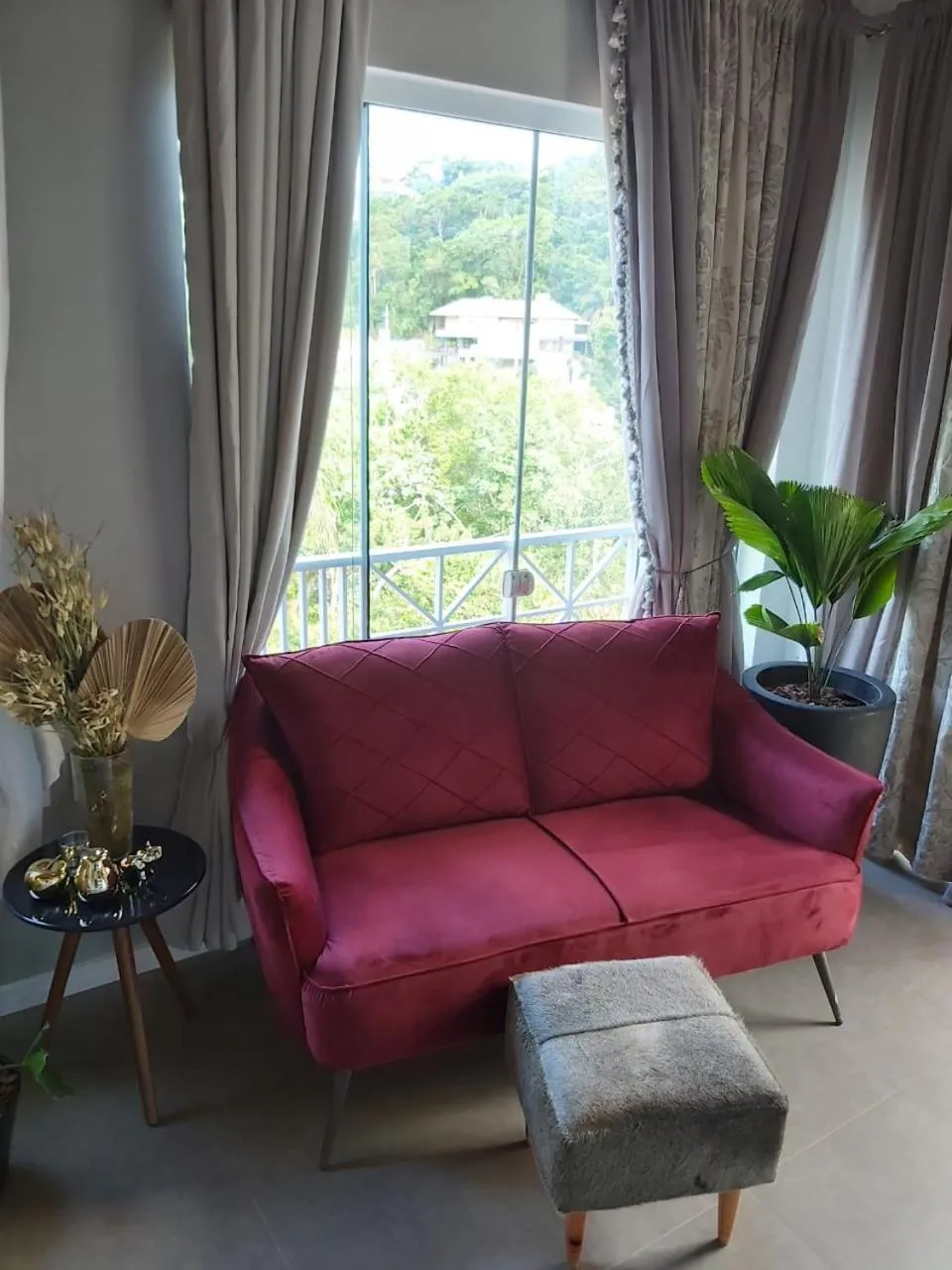 Living room in Bombinhas Guest House