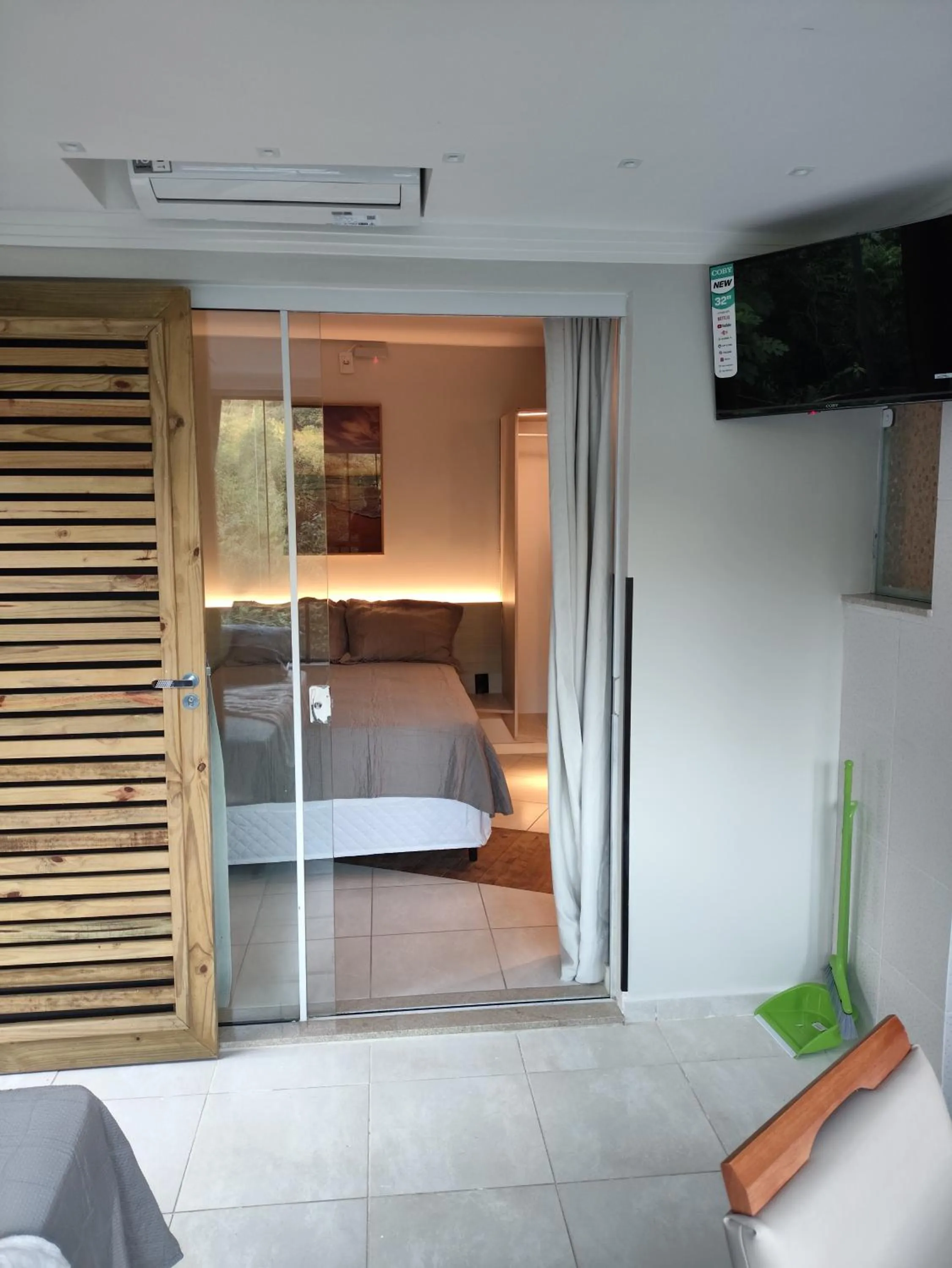 Bed in Bombinhas Guest House