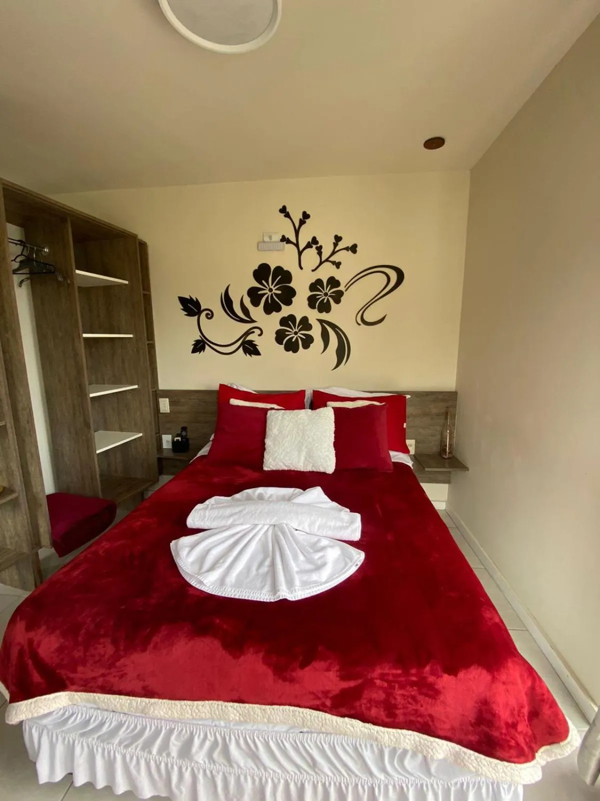 Bed in Bombinhas Guest House