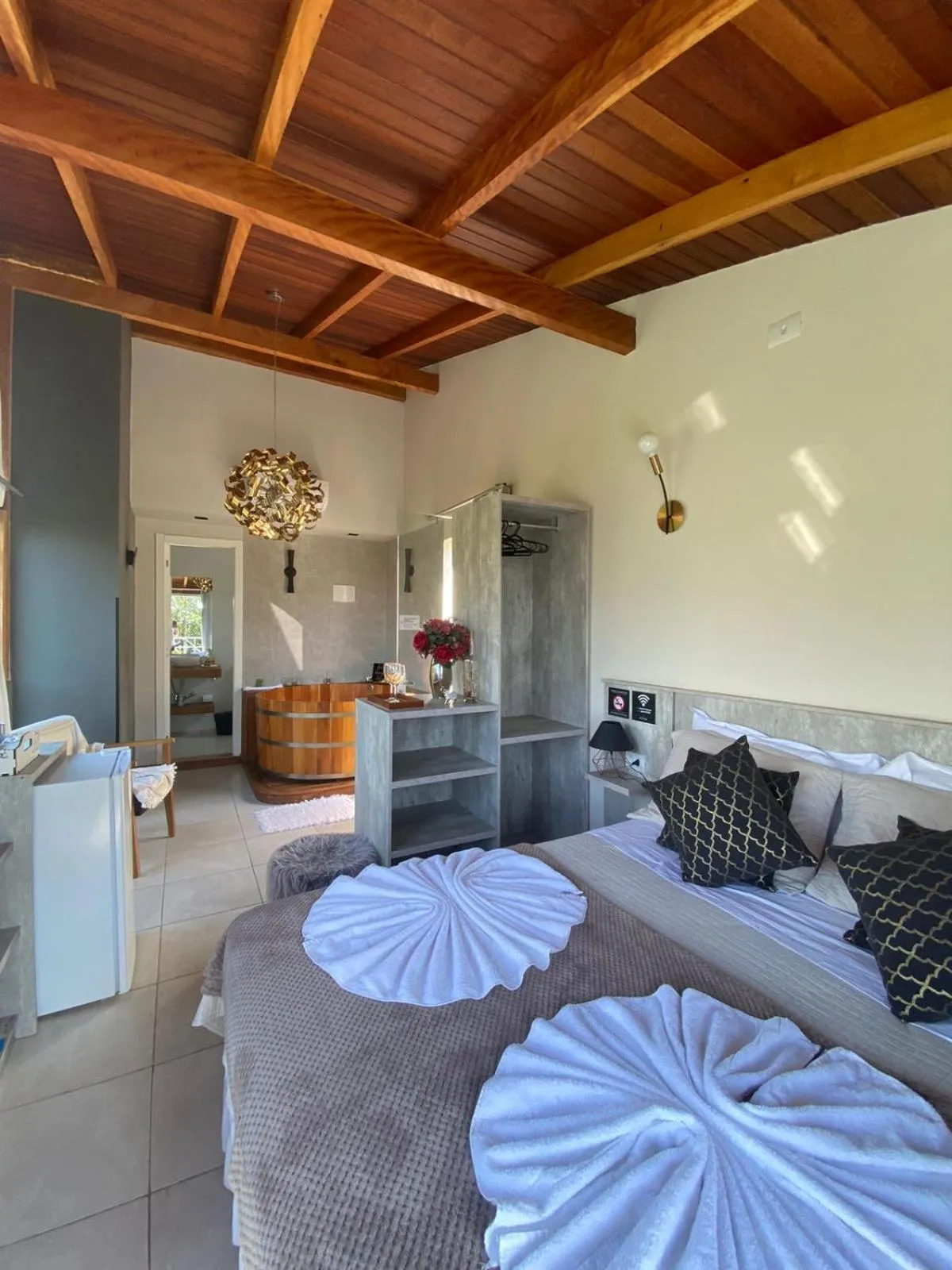 Bed in Bombinhas Guest House