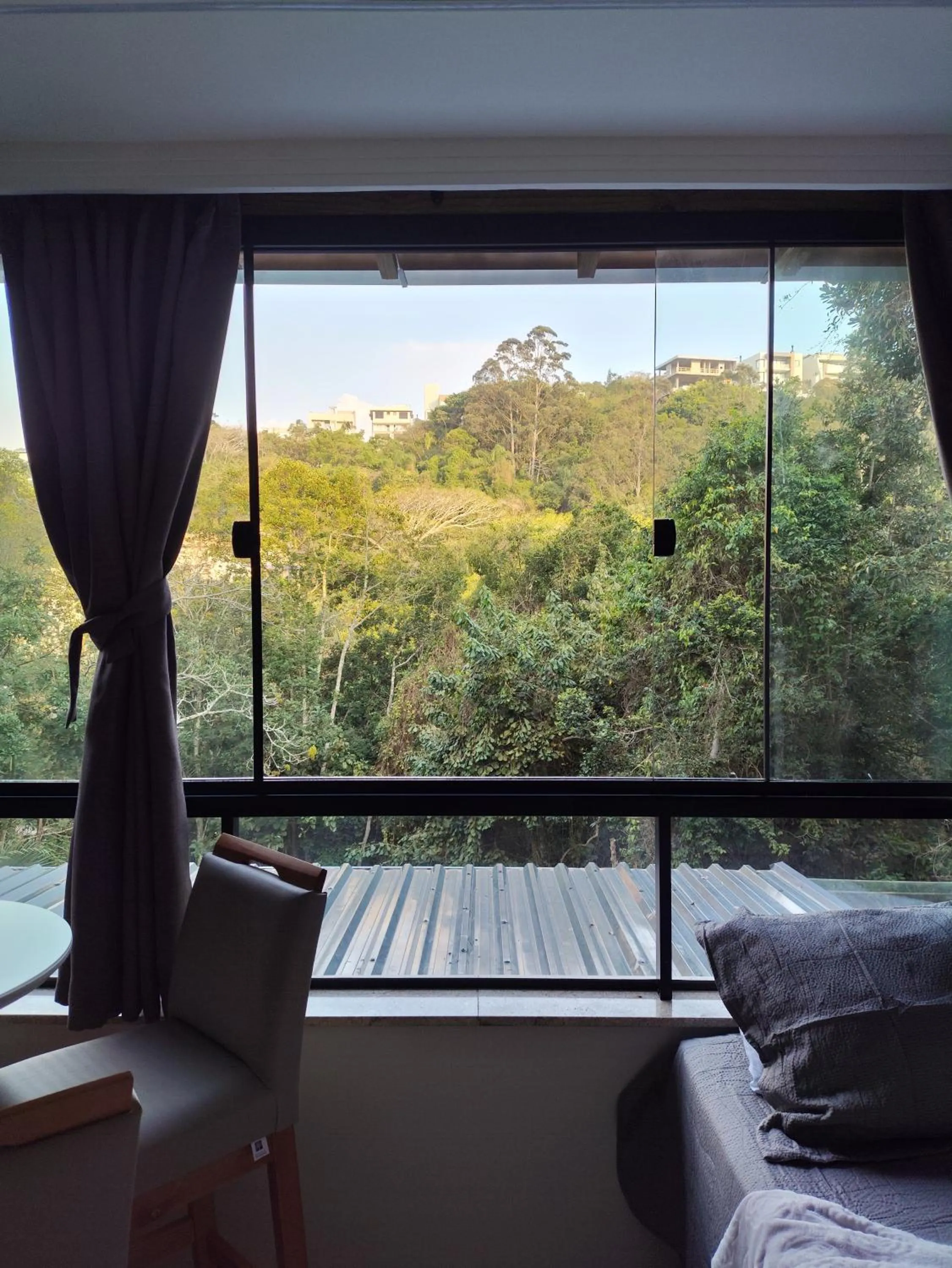 Bed in Bombinhas Guest House