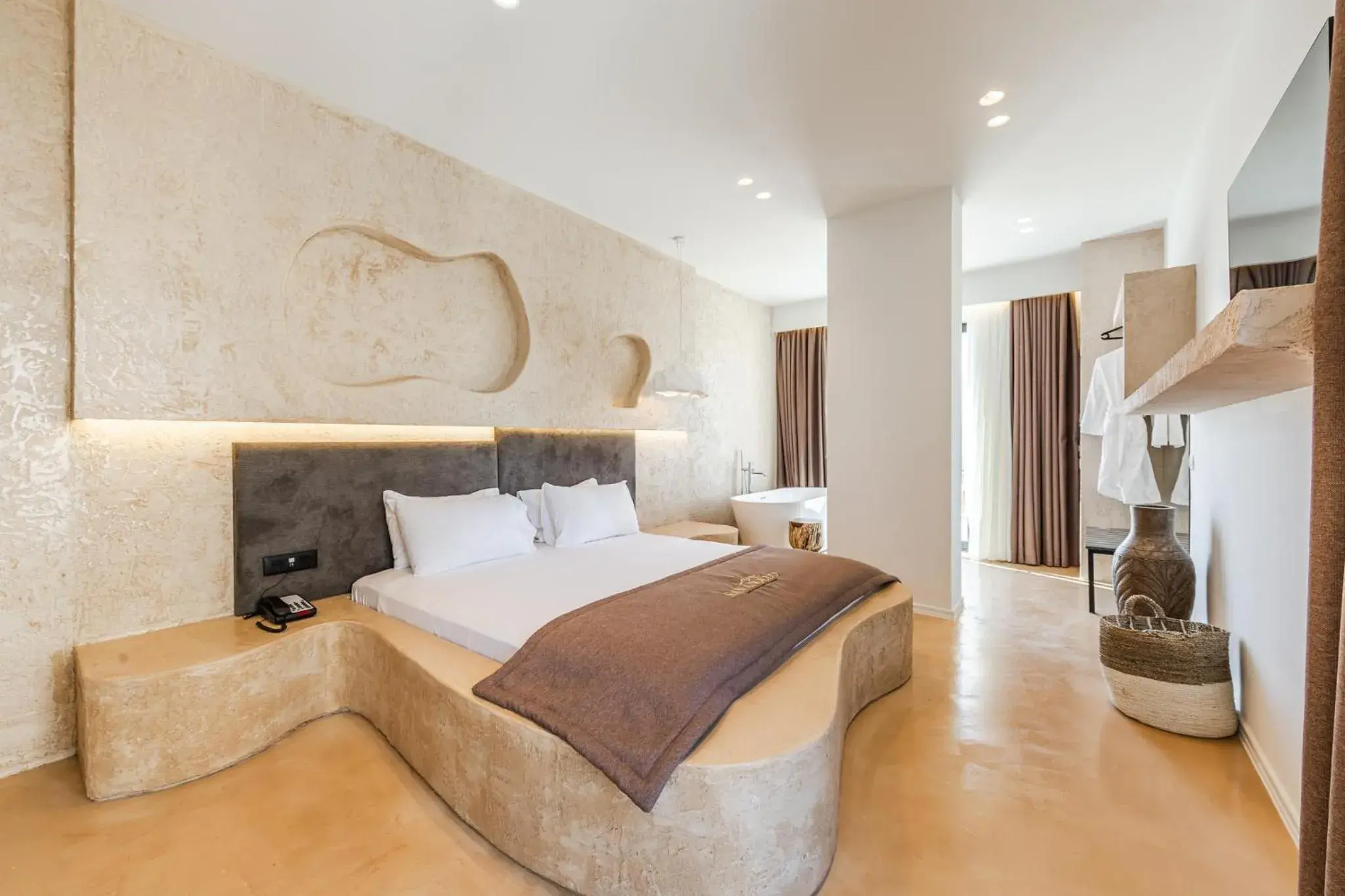 Junior Suite with Side Sea View and Bath Tub in San Angelo Luxury Resort & Spa - Adults Only Junior Suite with Side Sea View and Bath Tub in San Angelo Luxury Resort & Spa - Adults Only