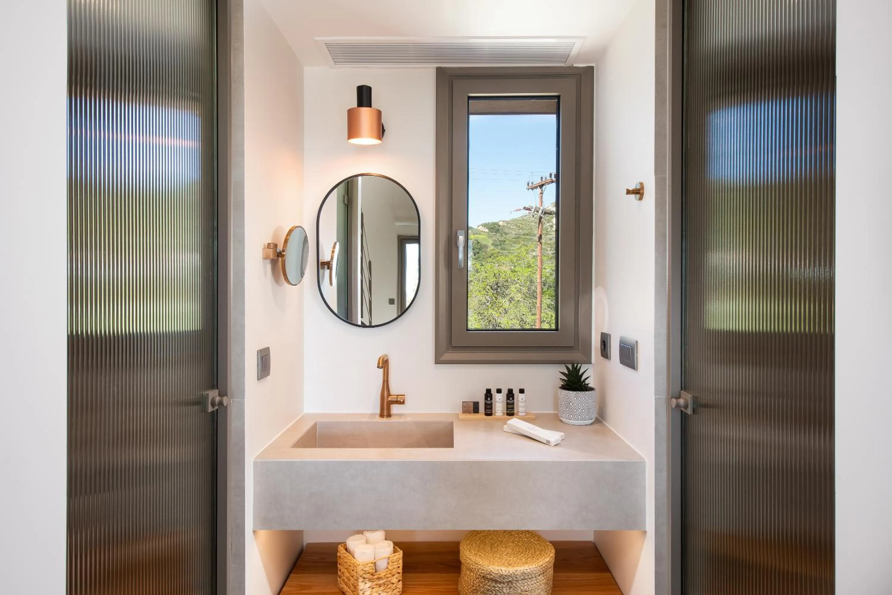 Bathroom in Reveli Suites