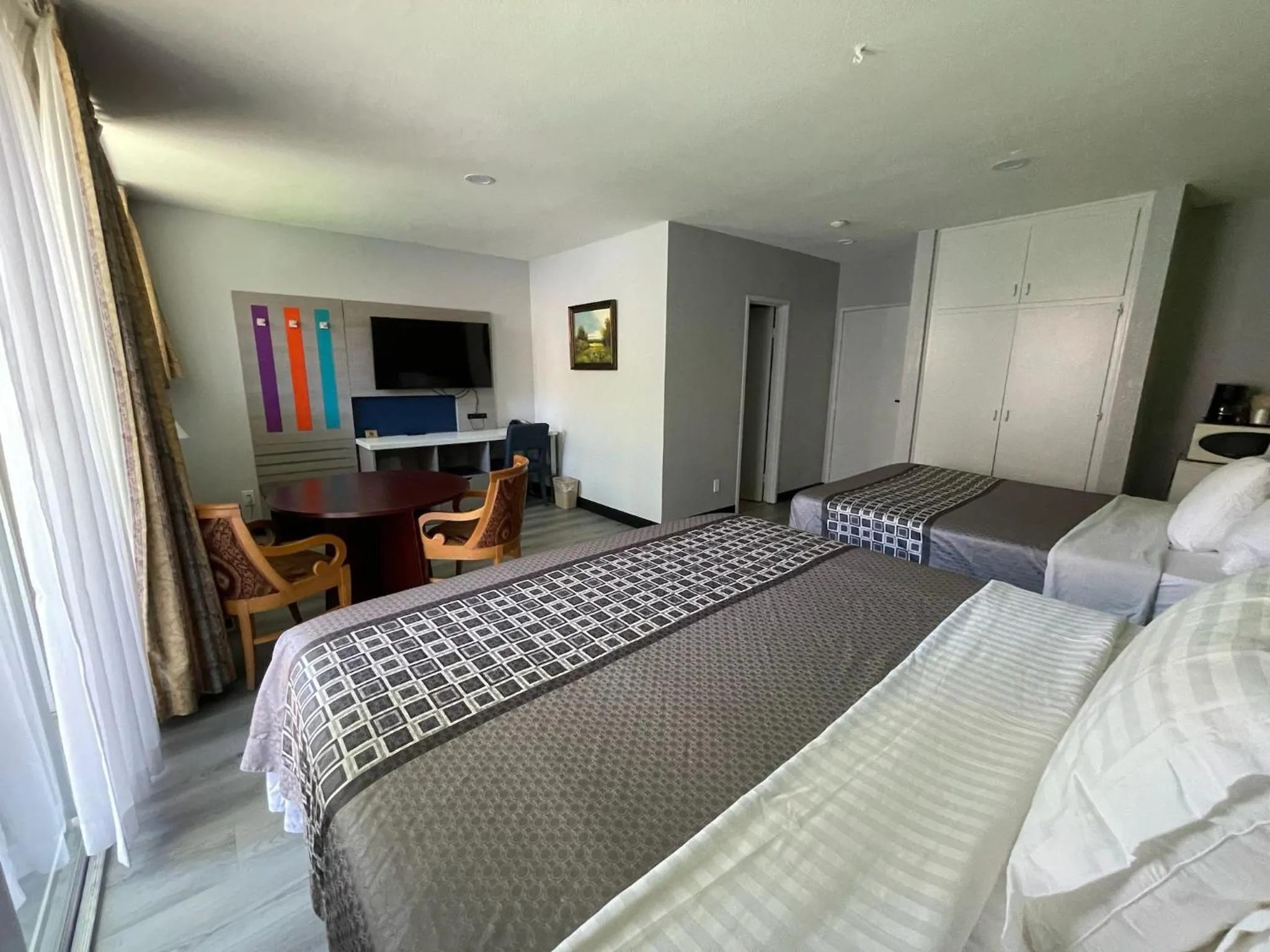 Bed in Hotel Pacific Garden