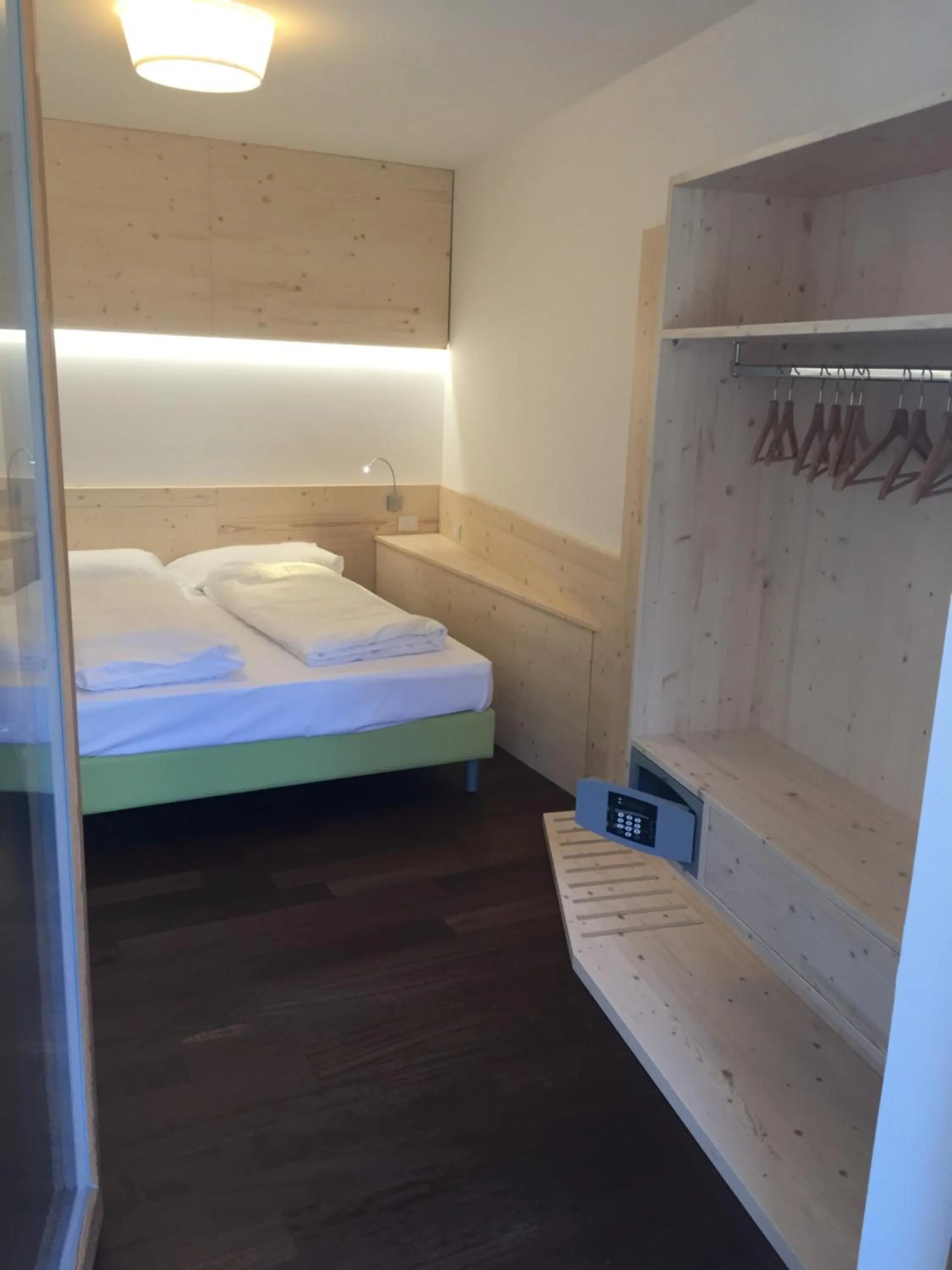 Bed in Komodo short stay apartments