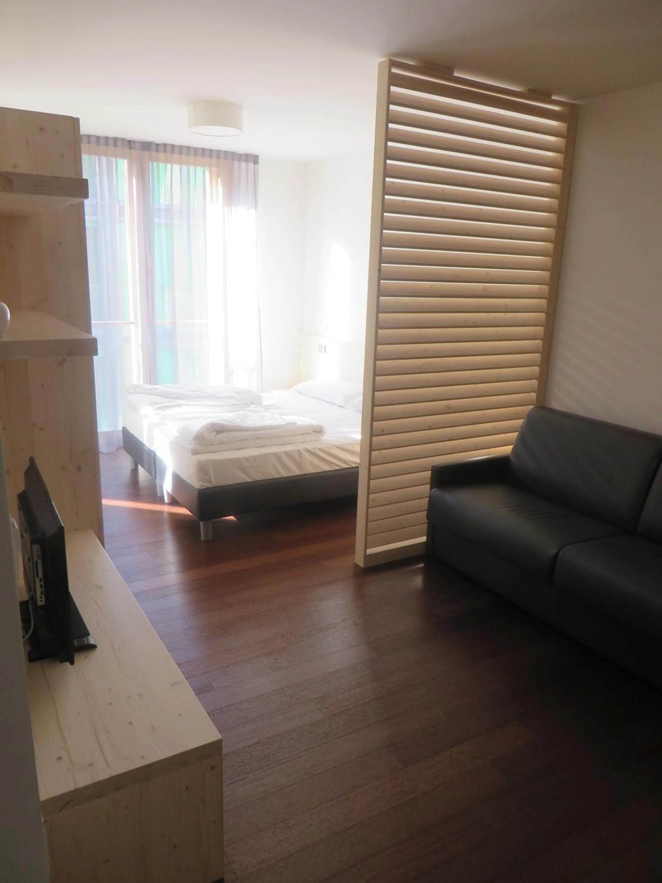 Day, Bed in Komodo short stay apartments