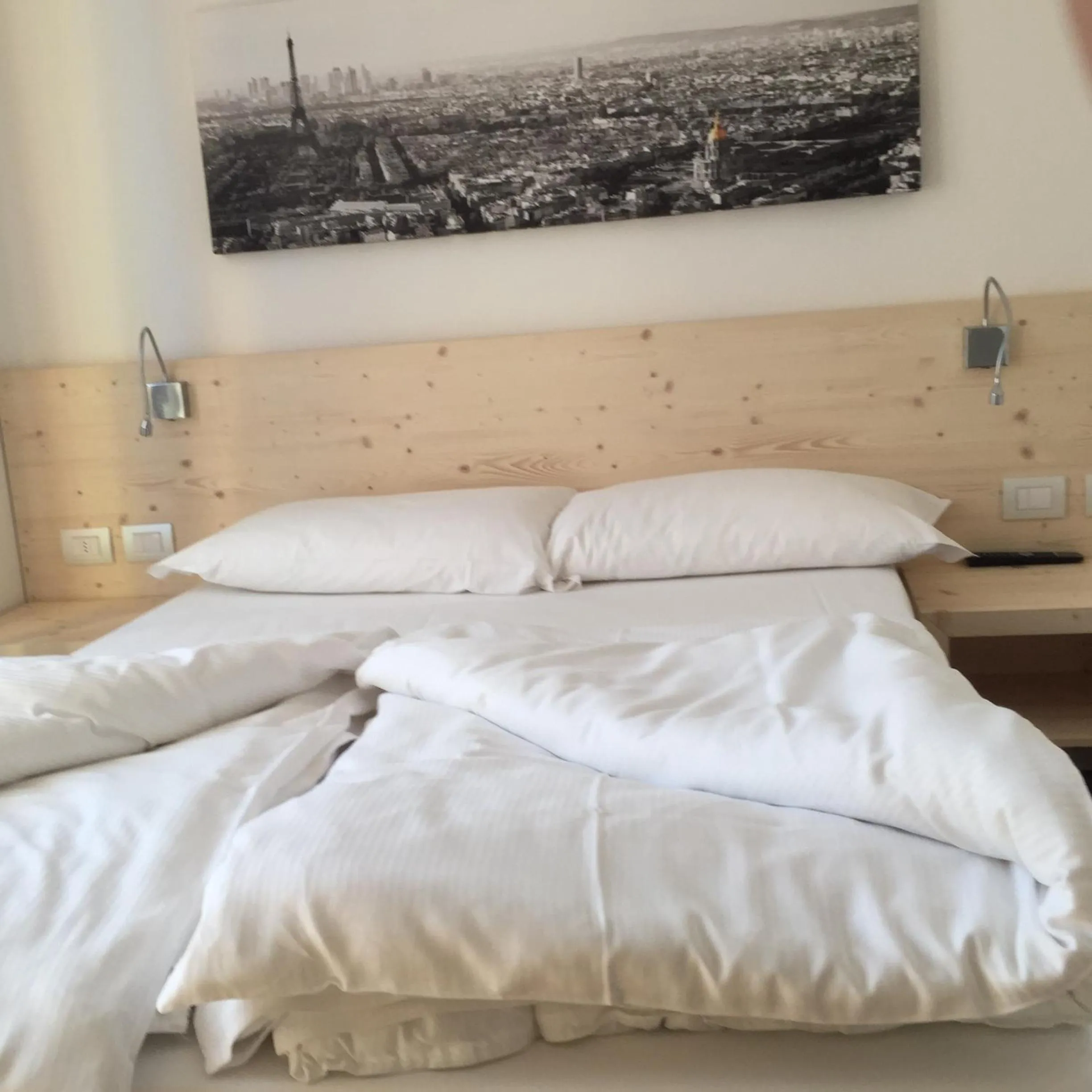 Bed in Komodo short stay apartments