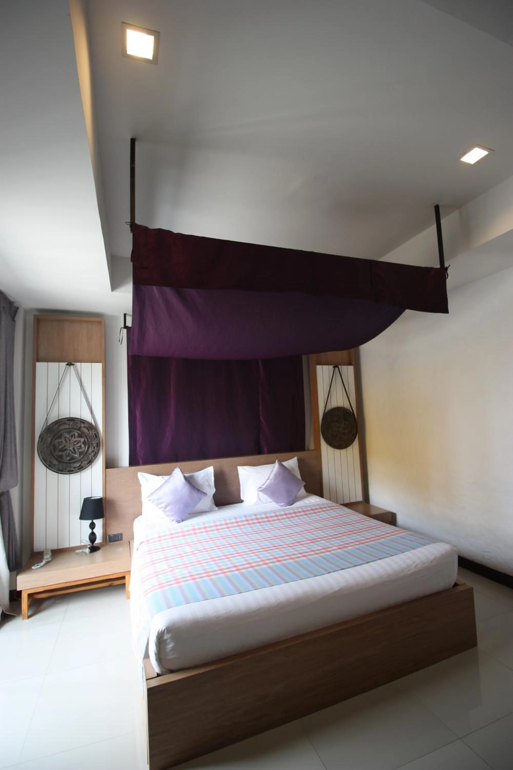 Bed in Nakorn De Sukhothai Hip Hotel