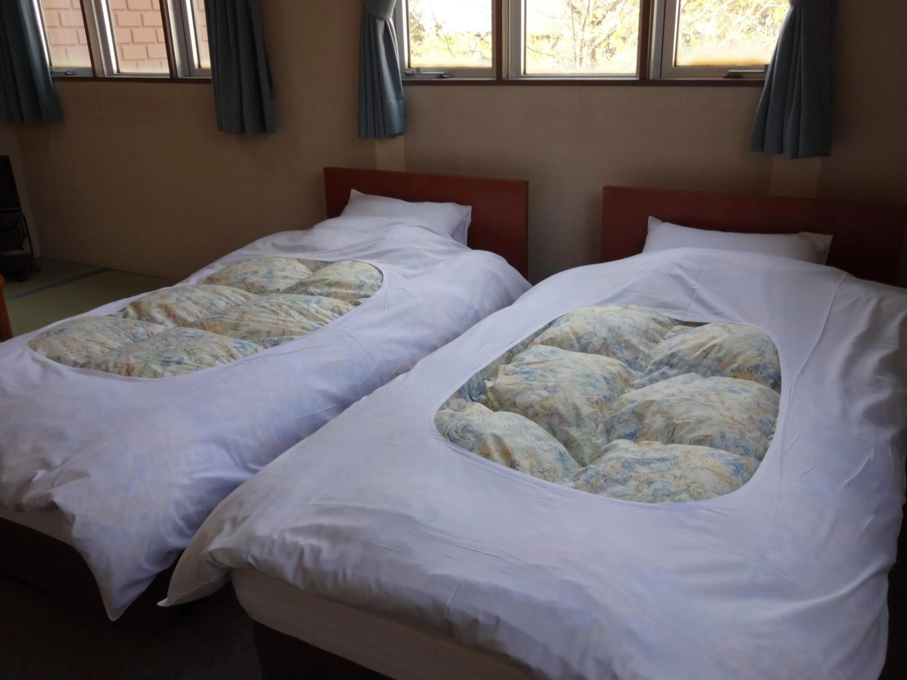 Bed in Oomukou Ryokan