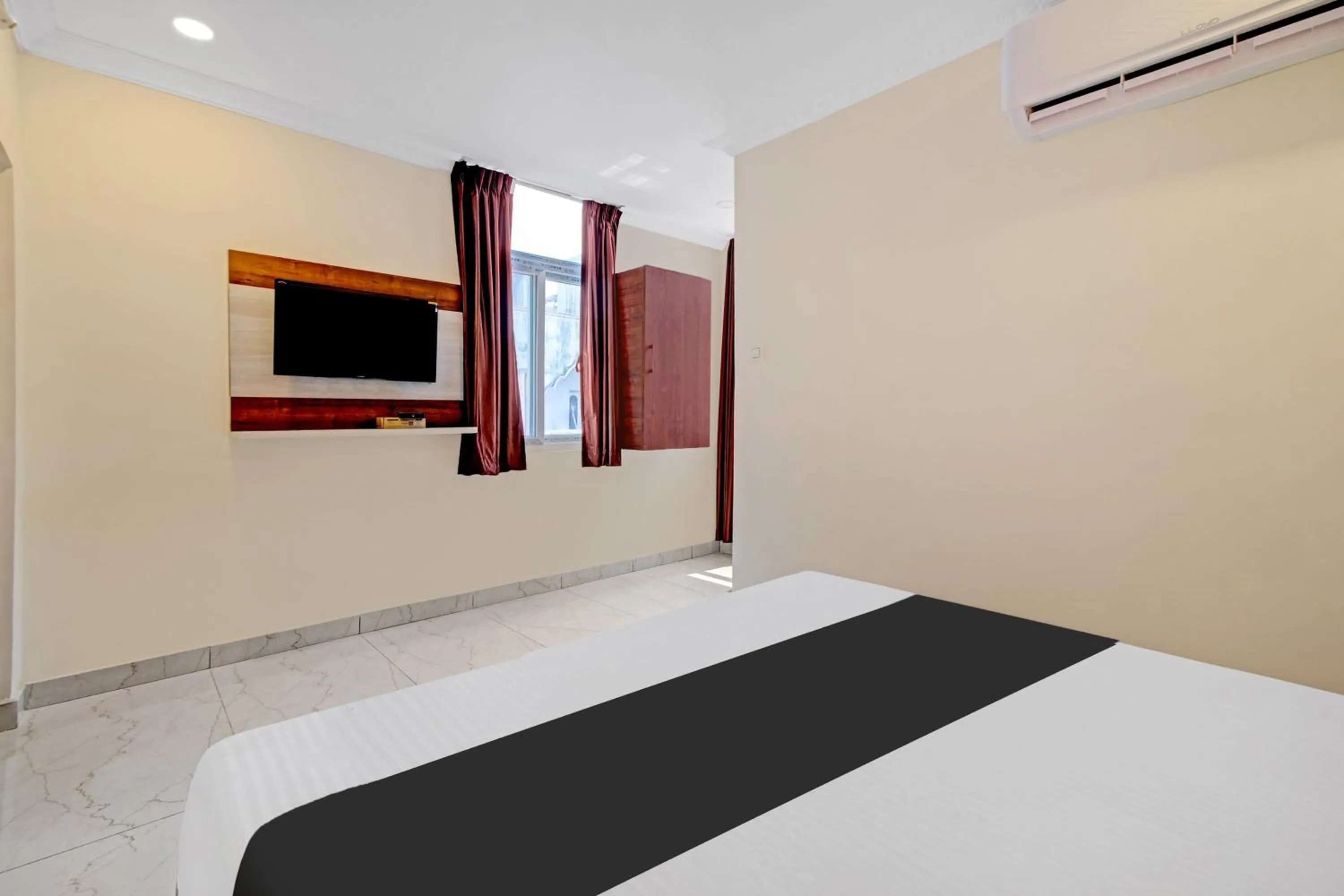 Bedroom in Hotel O Leela Elite