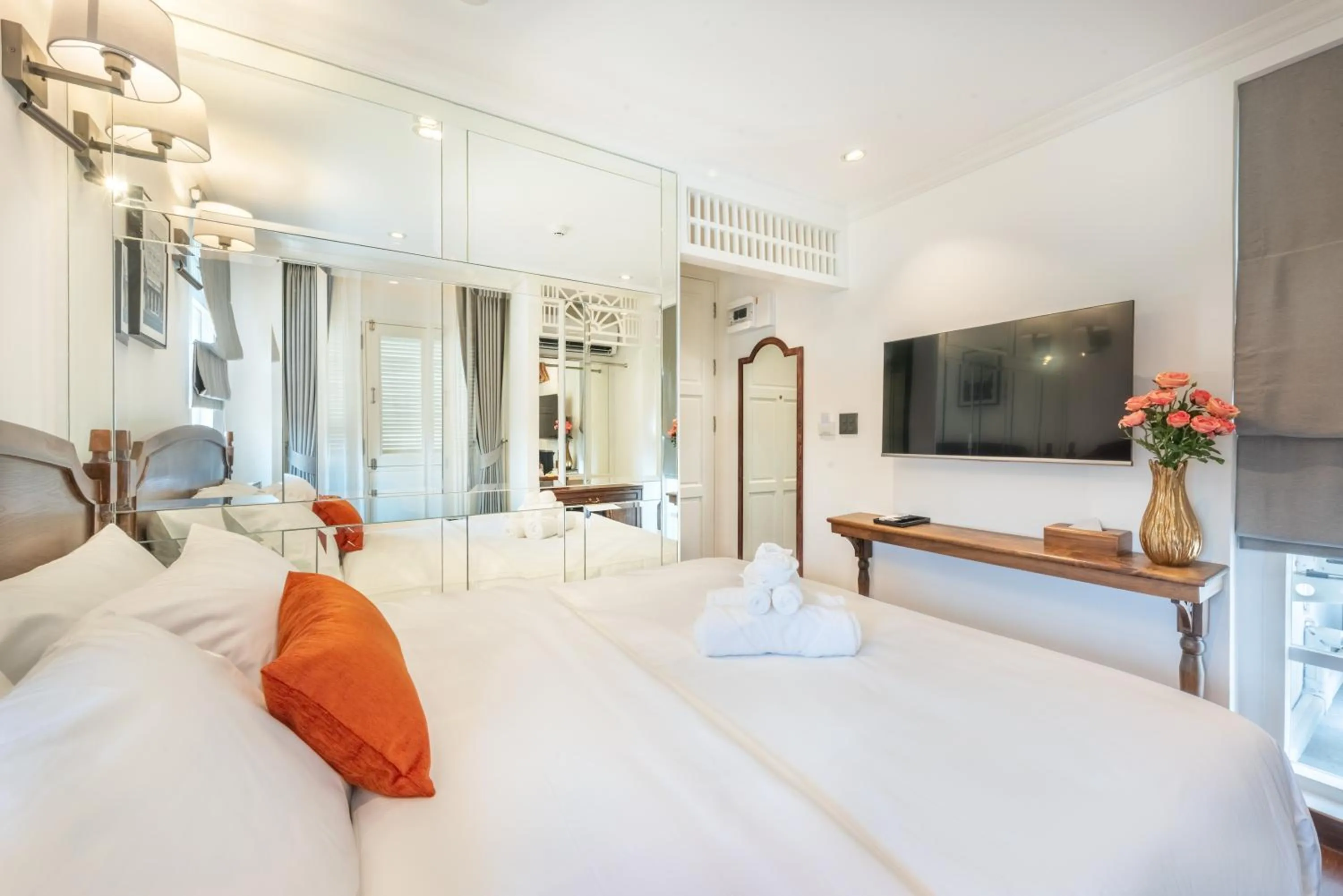 Bed in Cherie Bangkok Boutique Hotel