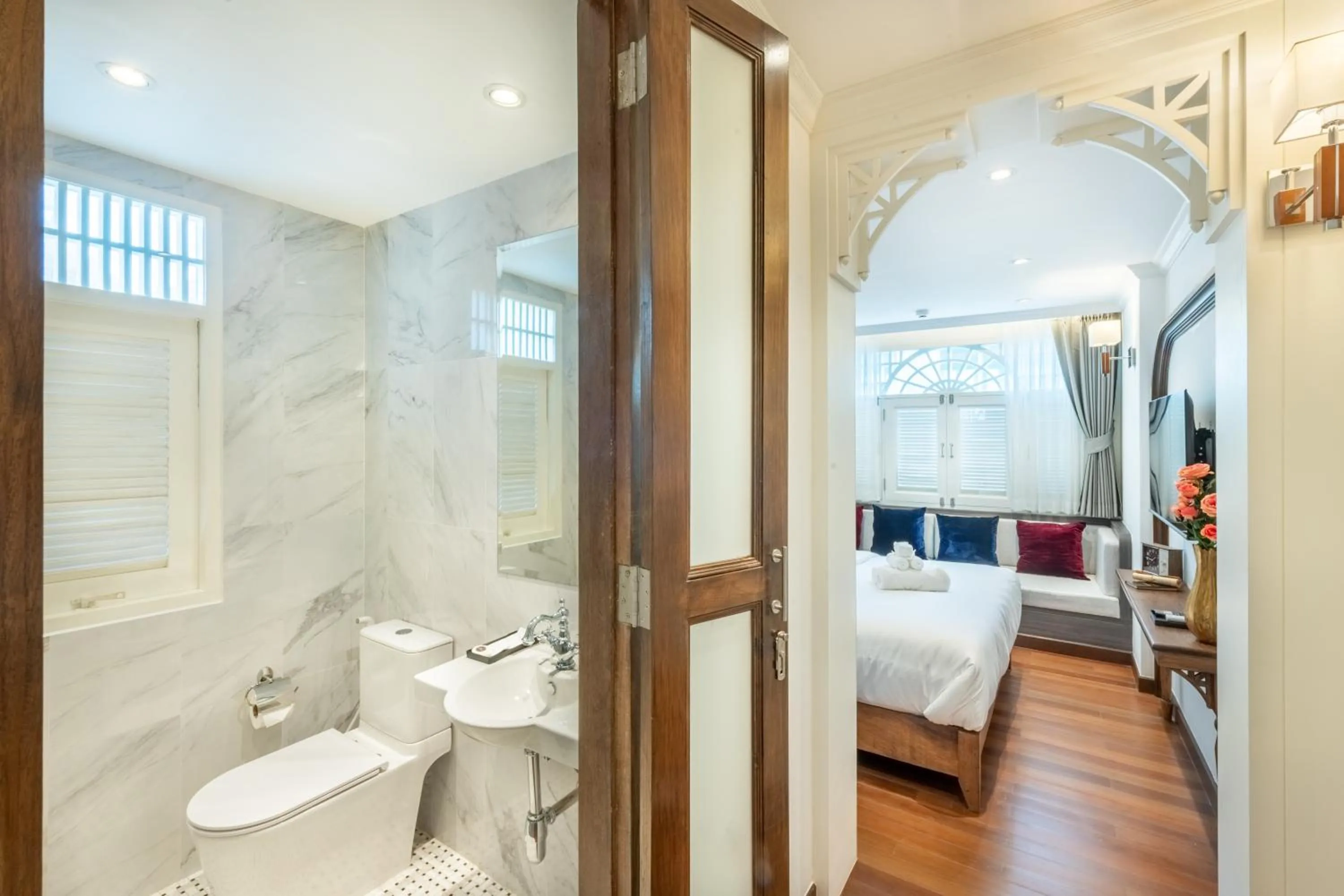 Bed in Cherie Bangkok Boutique Hotel