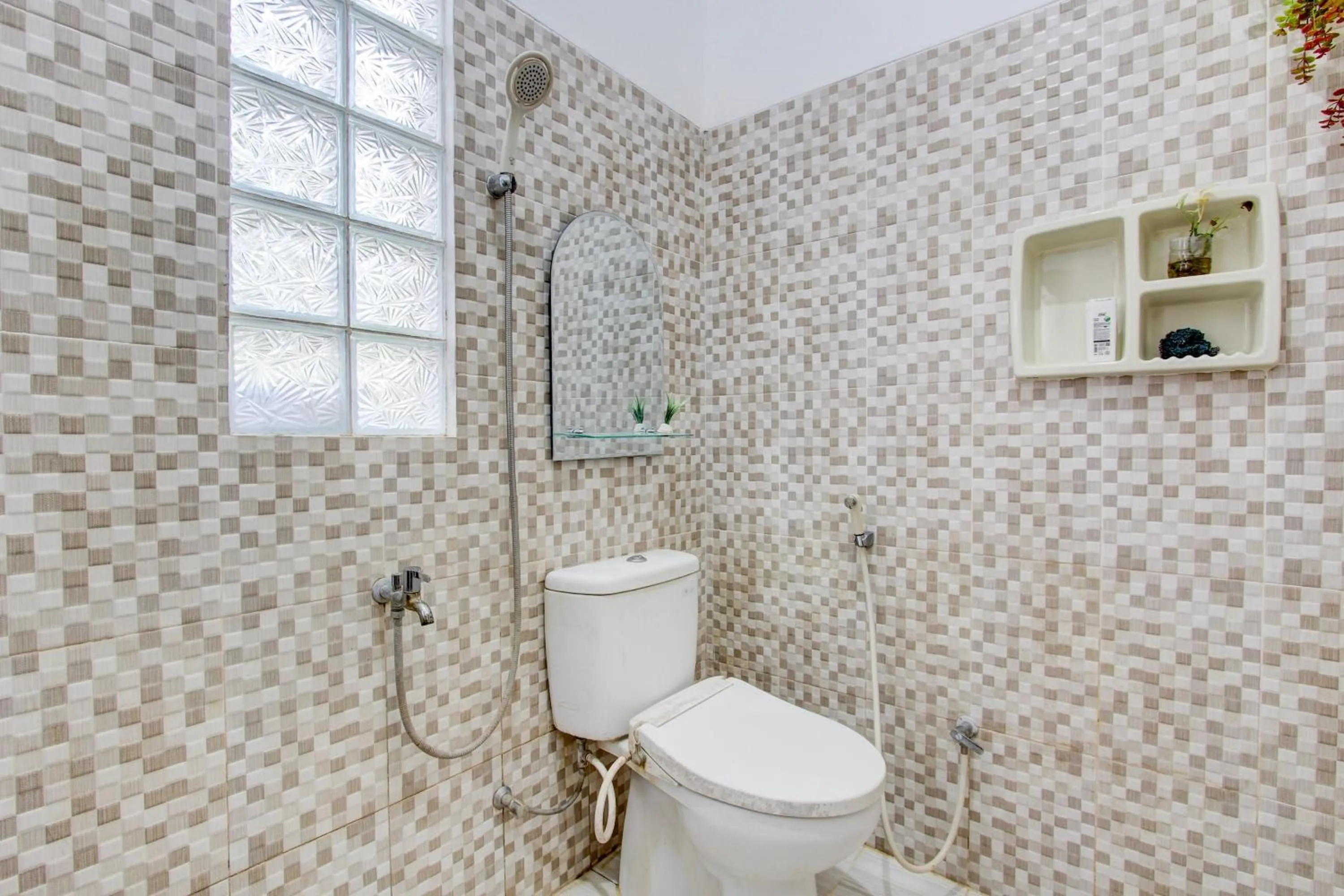 Bathroom in Hotel O Homestay Koe Syariah