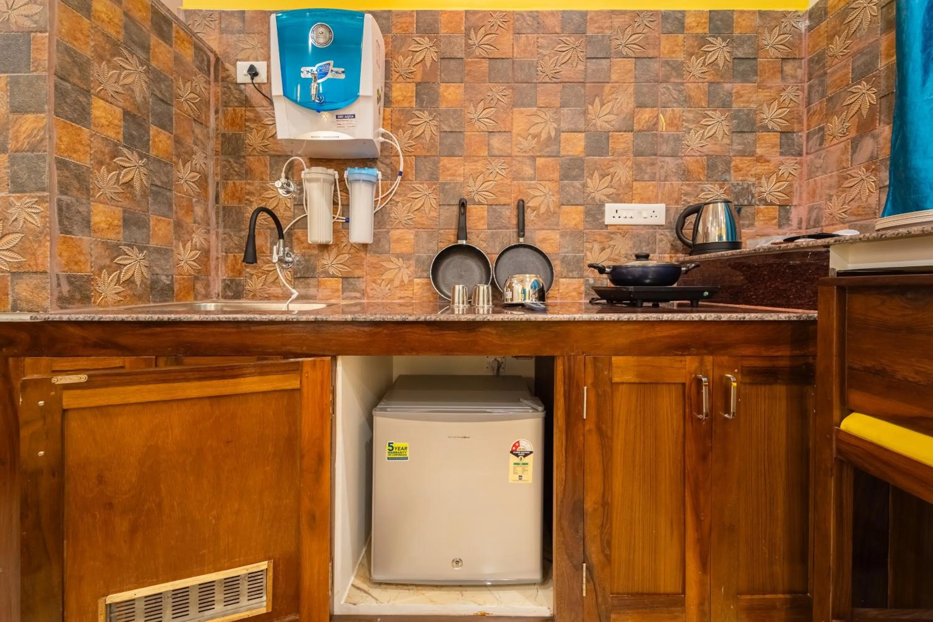 Kitchen or kitchenette in Teak Leaf Gateway Villa with Swimming Pool Indoor Games