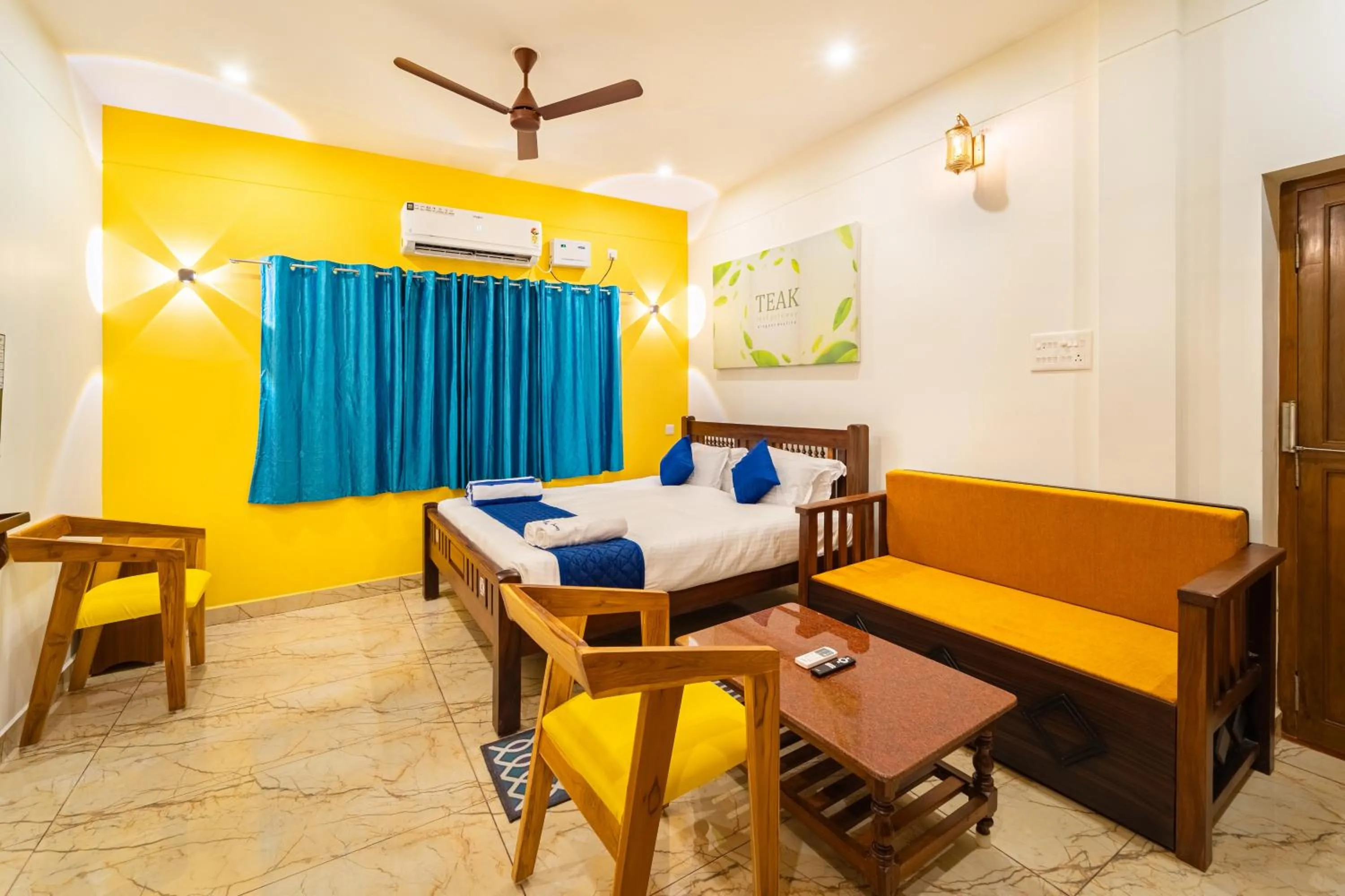 Seating area, Bed in Teak Leaf Gateway Villa with Swimming Pool Indoor Games