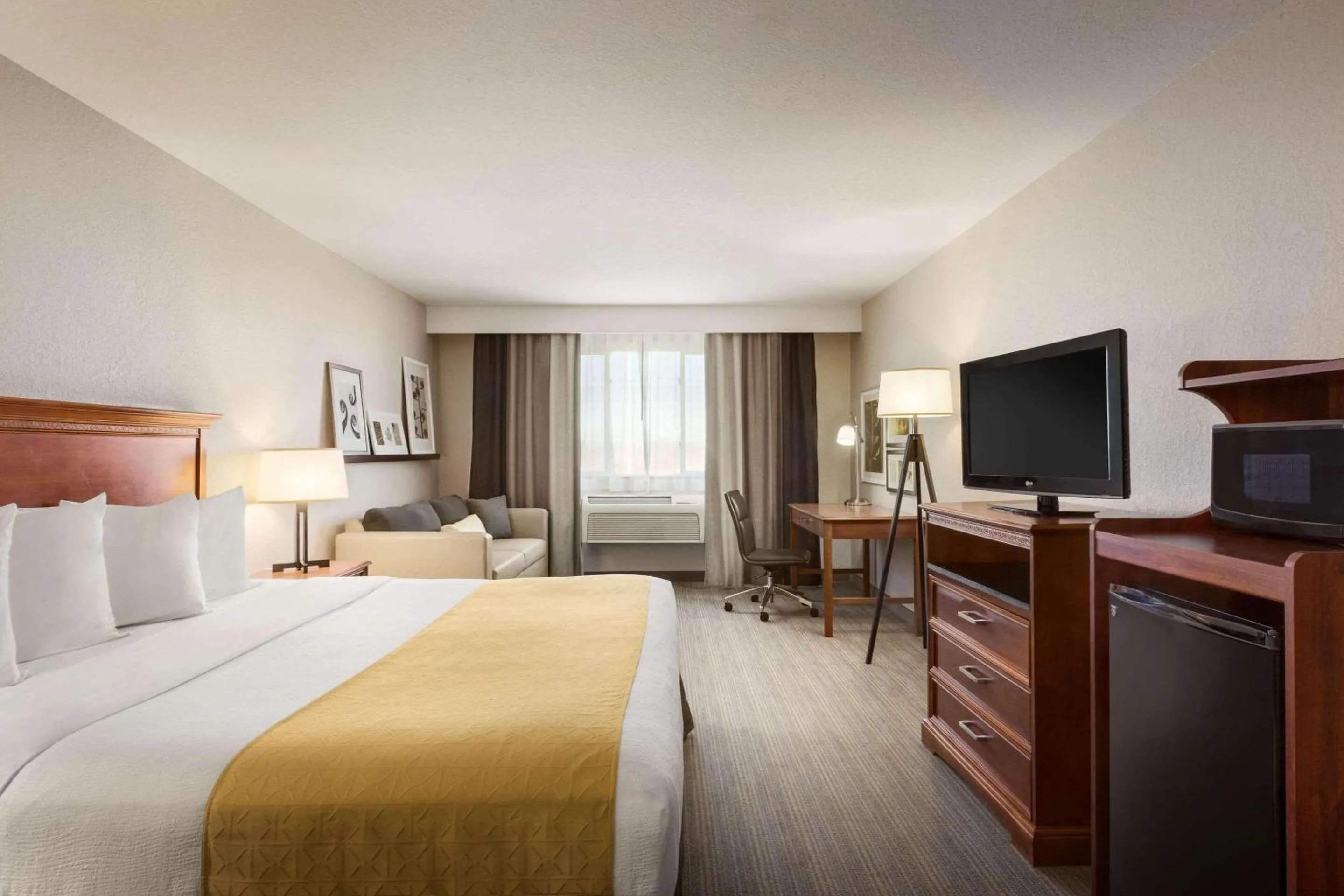 Bedroom, Bed in Country Inn & Suites by Radisson, Sidney, NE