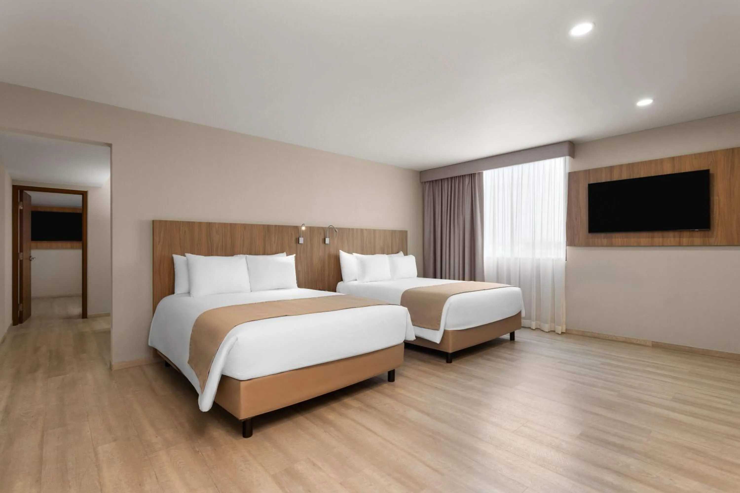 Photo of the whole room, Bed in Wyndham Garden Mazatlan Marina