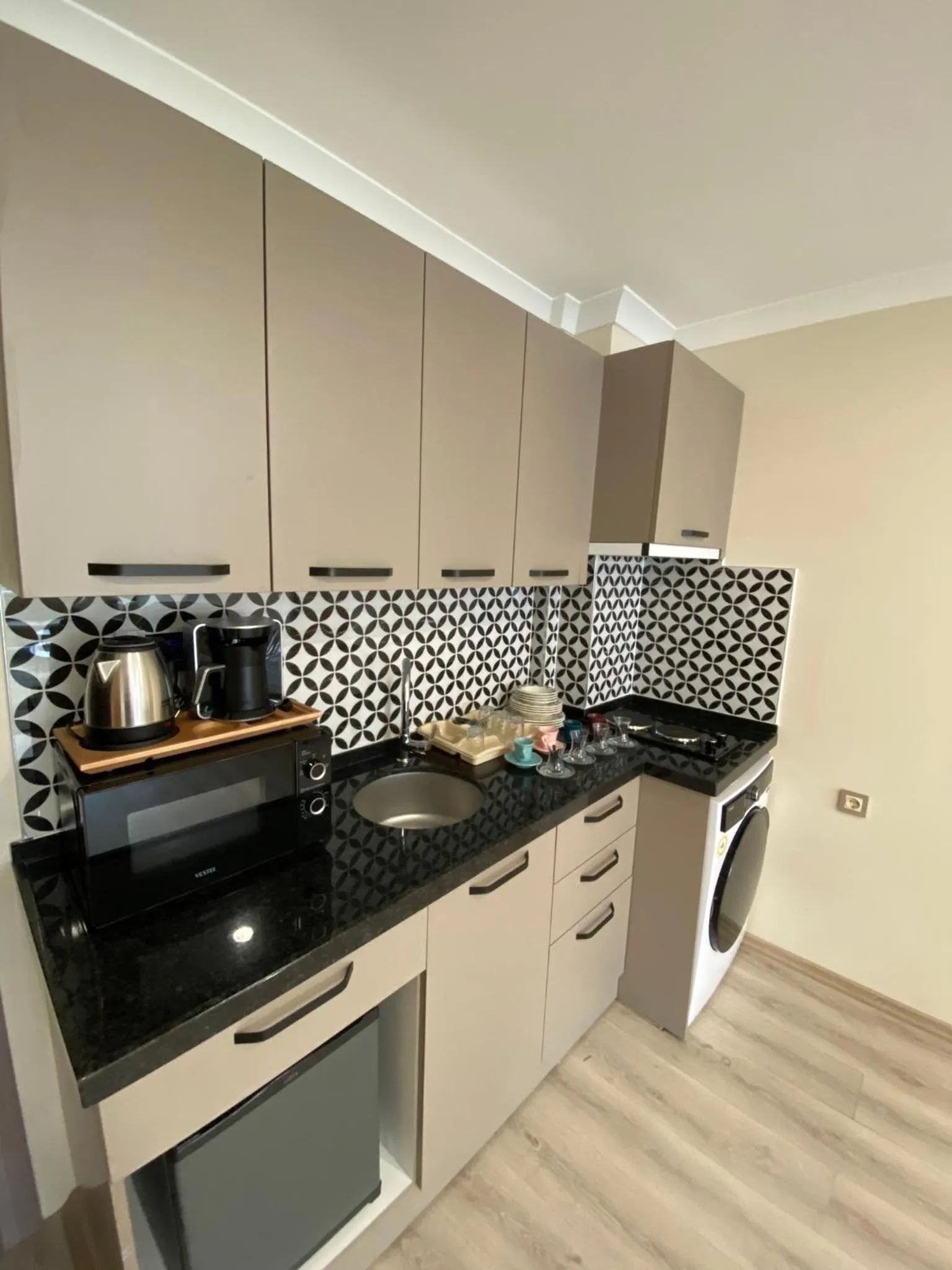 Kitchen or kitchenette in Rena Grand Residence & Suit