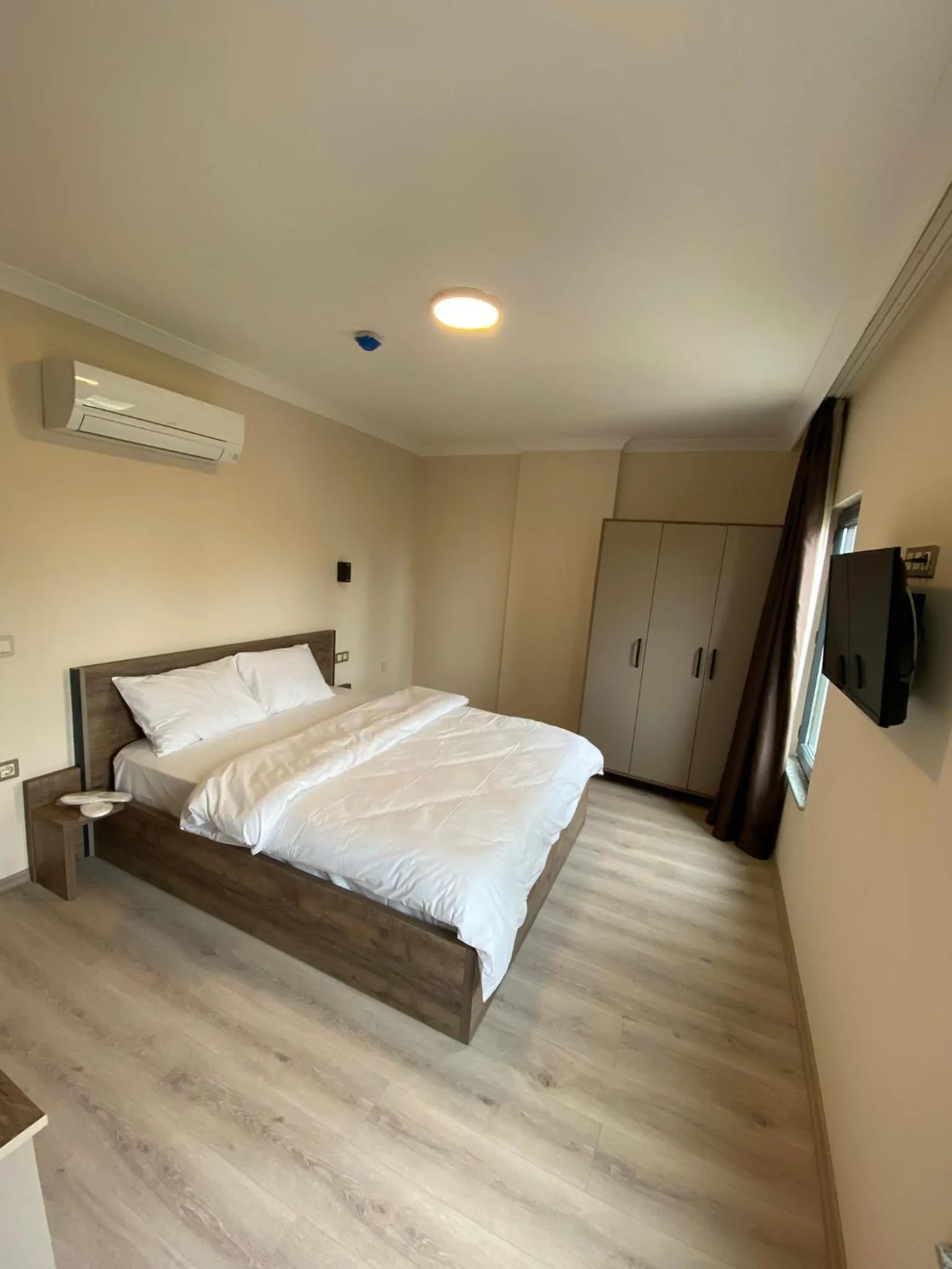 Bed in Rena Grand Residence & Suit