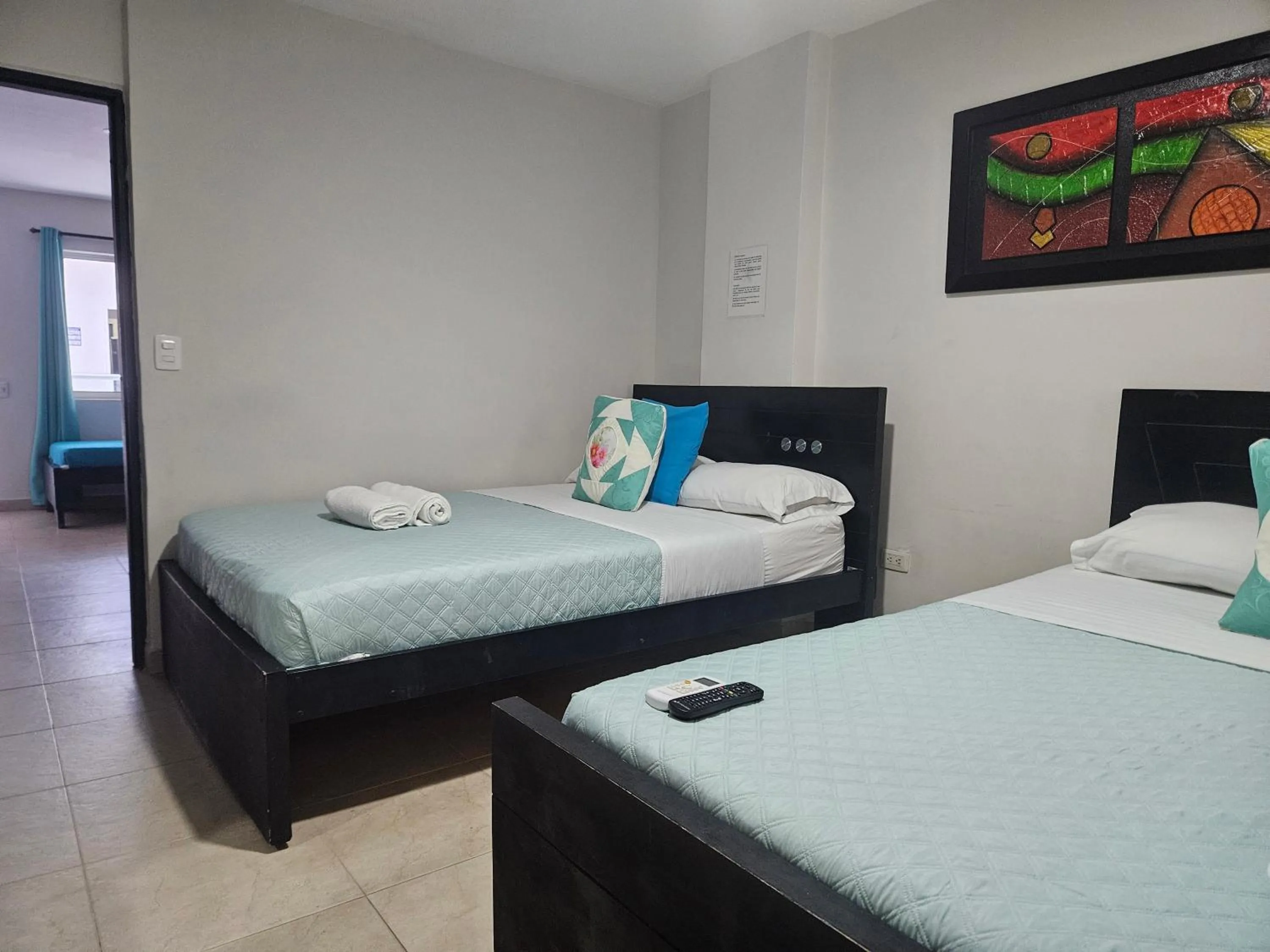 Bed in Caribbean Island Hotel Piso 2