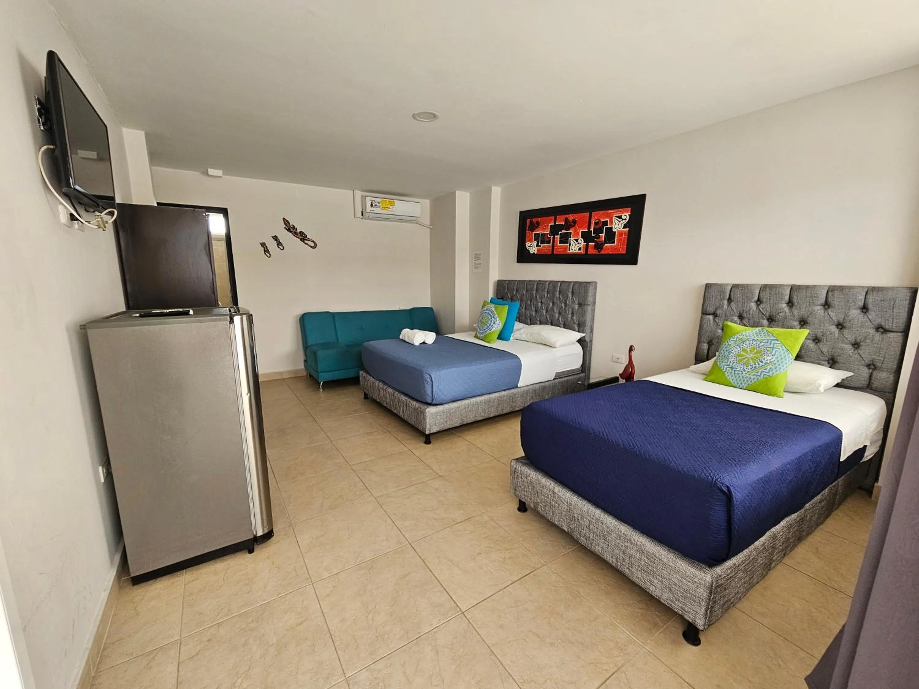 Bed in Caribbean Island Hotel Piso 2