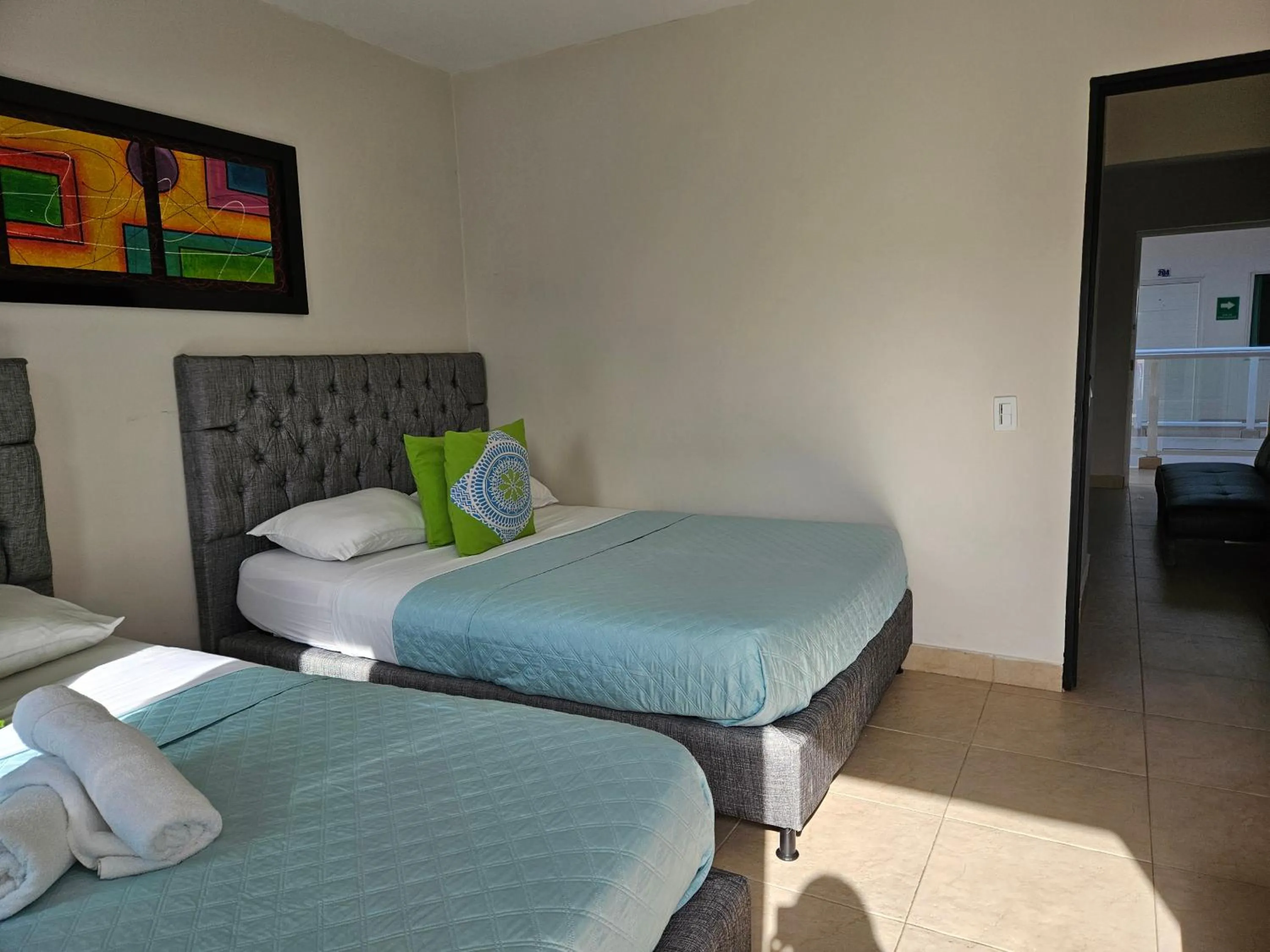 Bed in Caribbean Island Hotel Piso 2