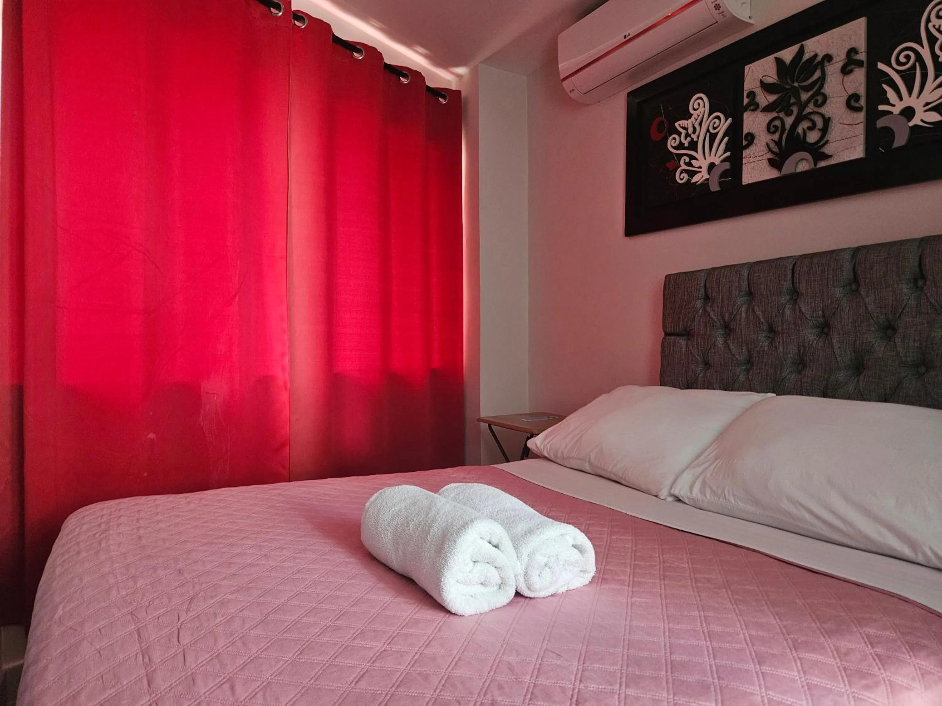 Bed in Caribbean Island Hotel Piso 2