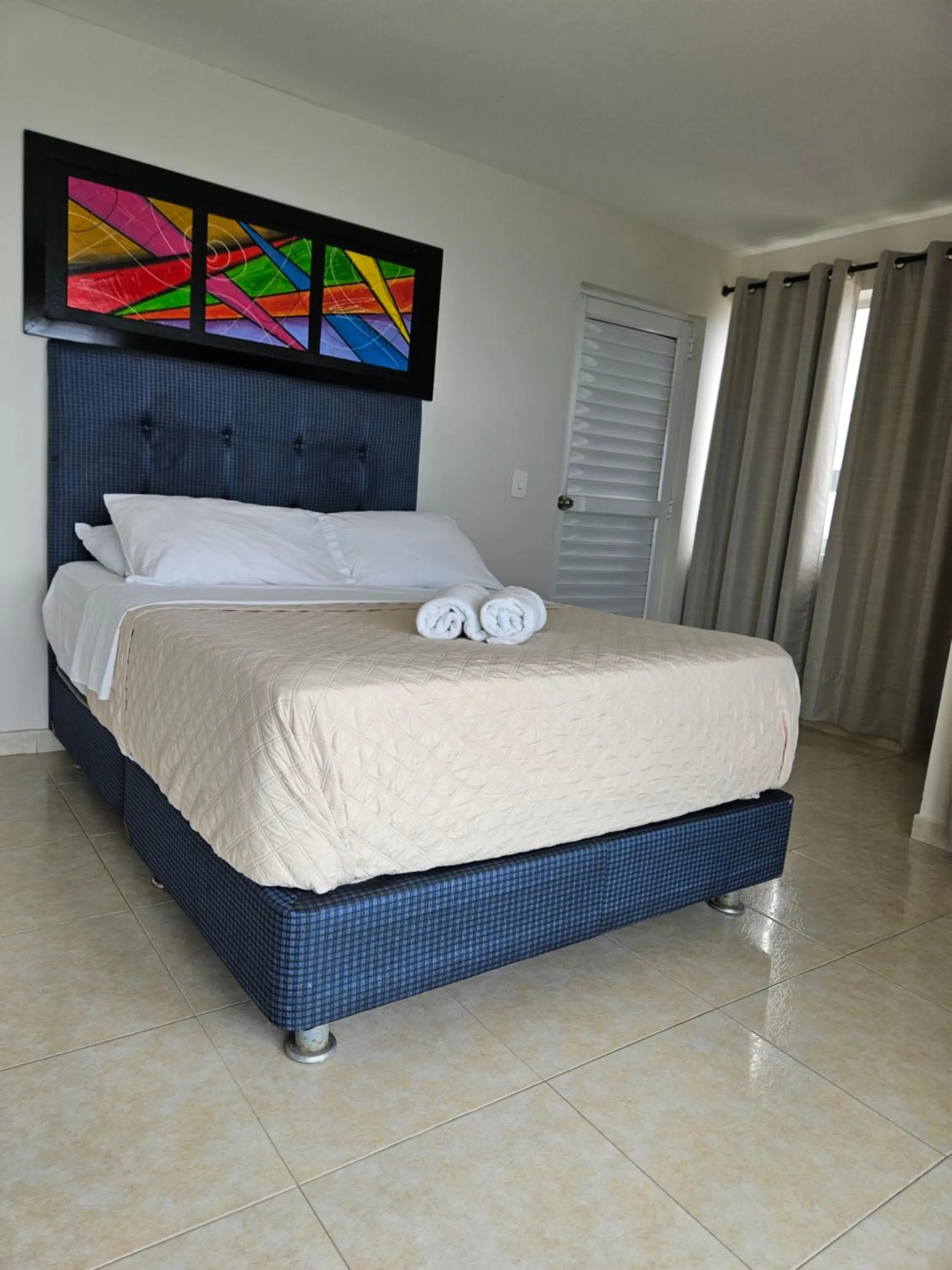 Bed in Caribbean Island Hotel Piso 2
