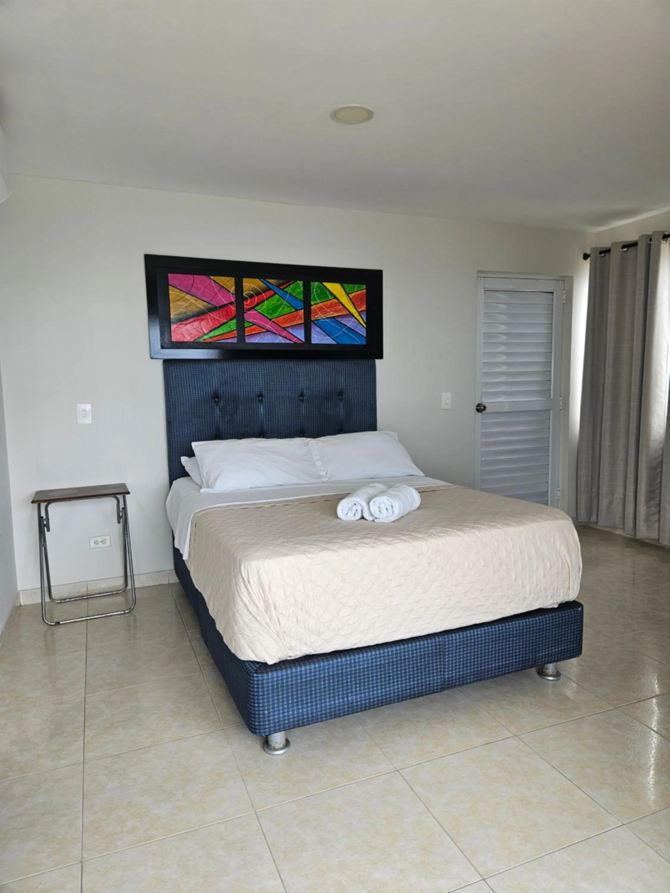 Bed in Caribbean Island Hotel Piso 2