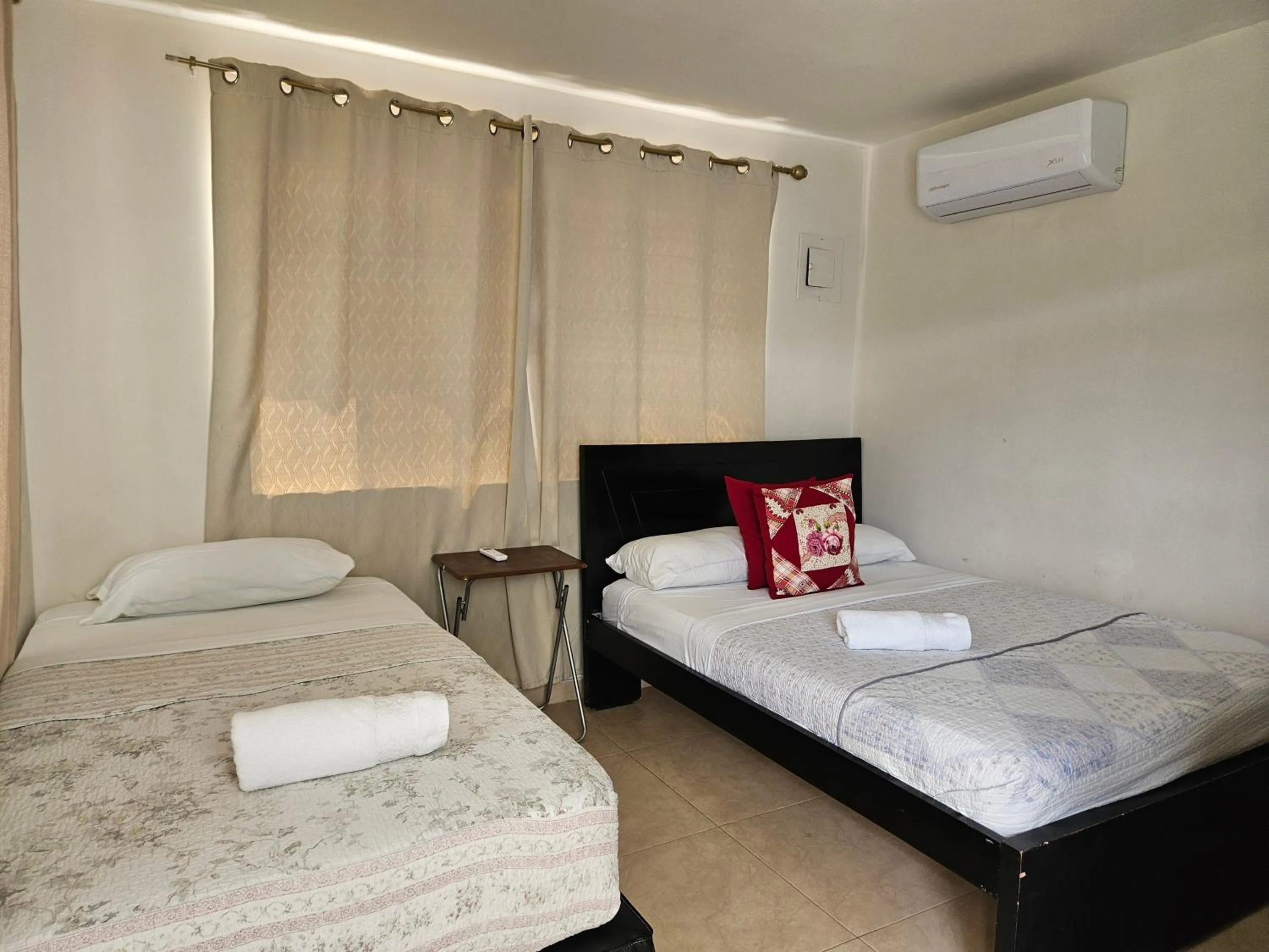 Bed in Caribbean Island Hotel Piso 2