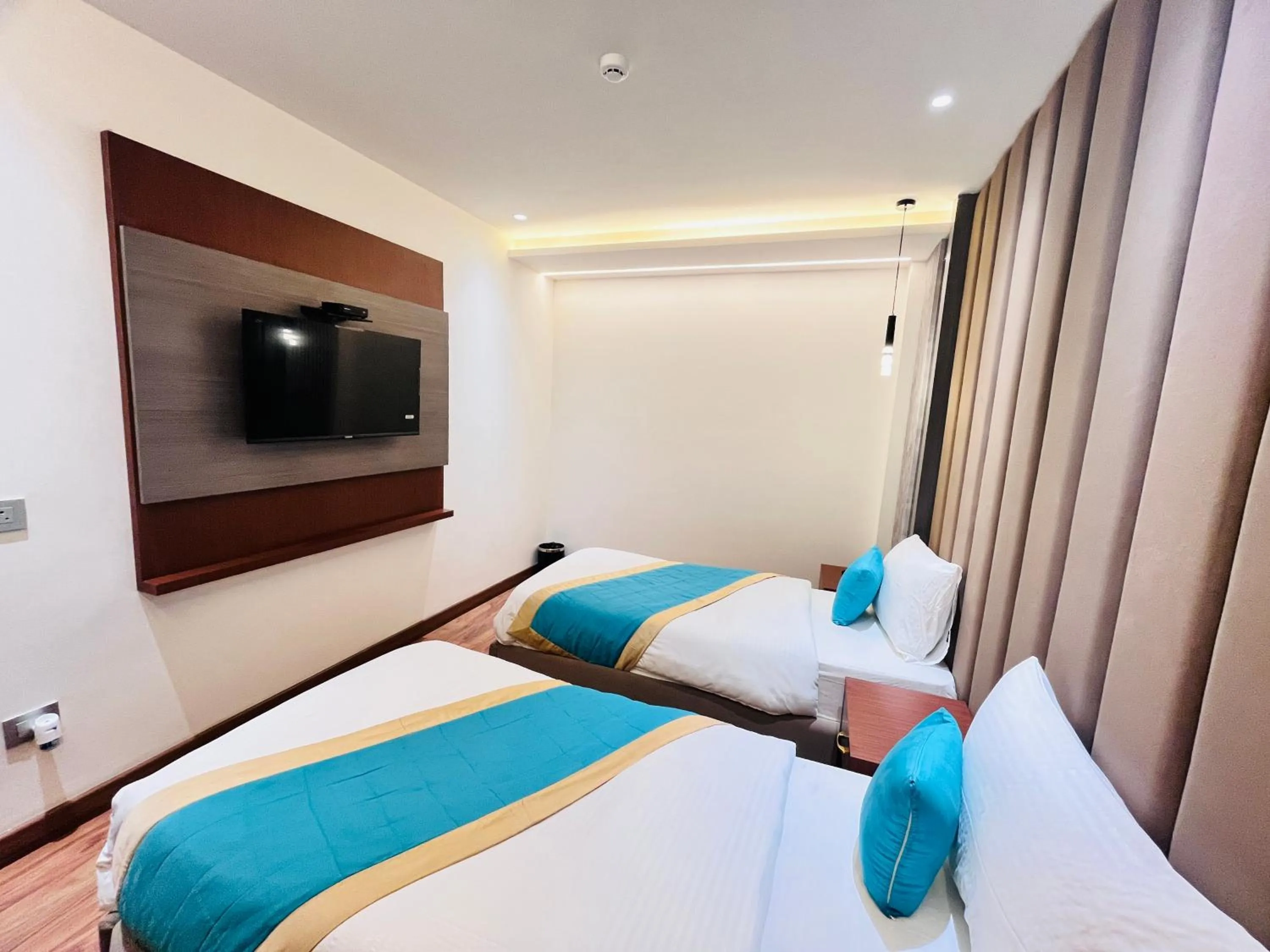 Bed in Western Blu INN