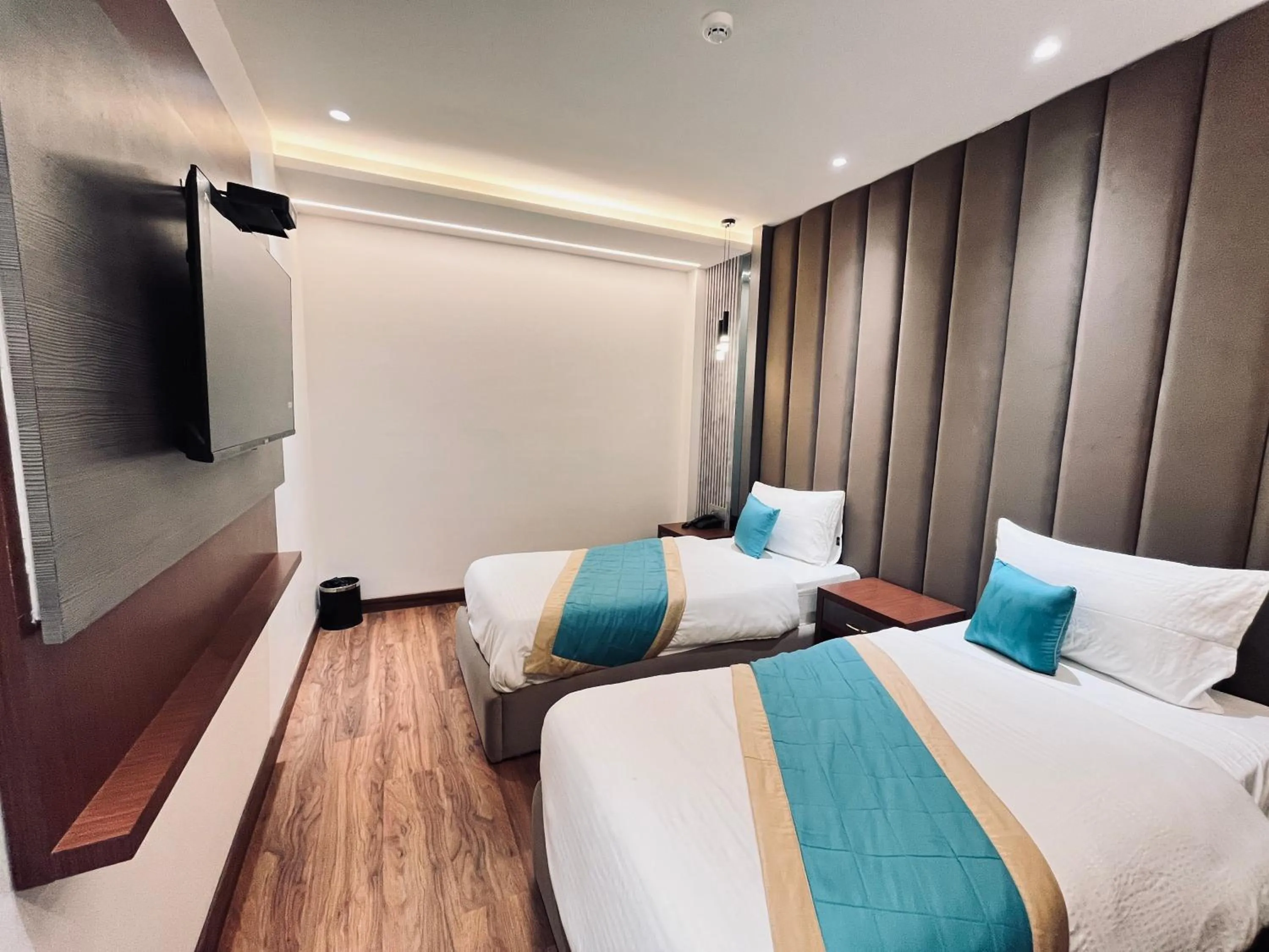 Bed in Western Blu INN