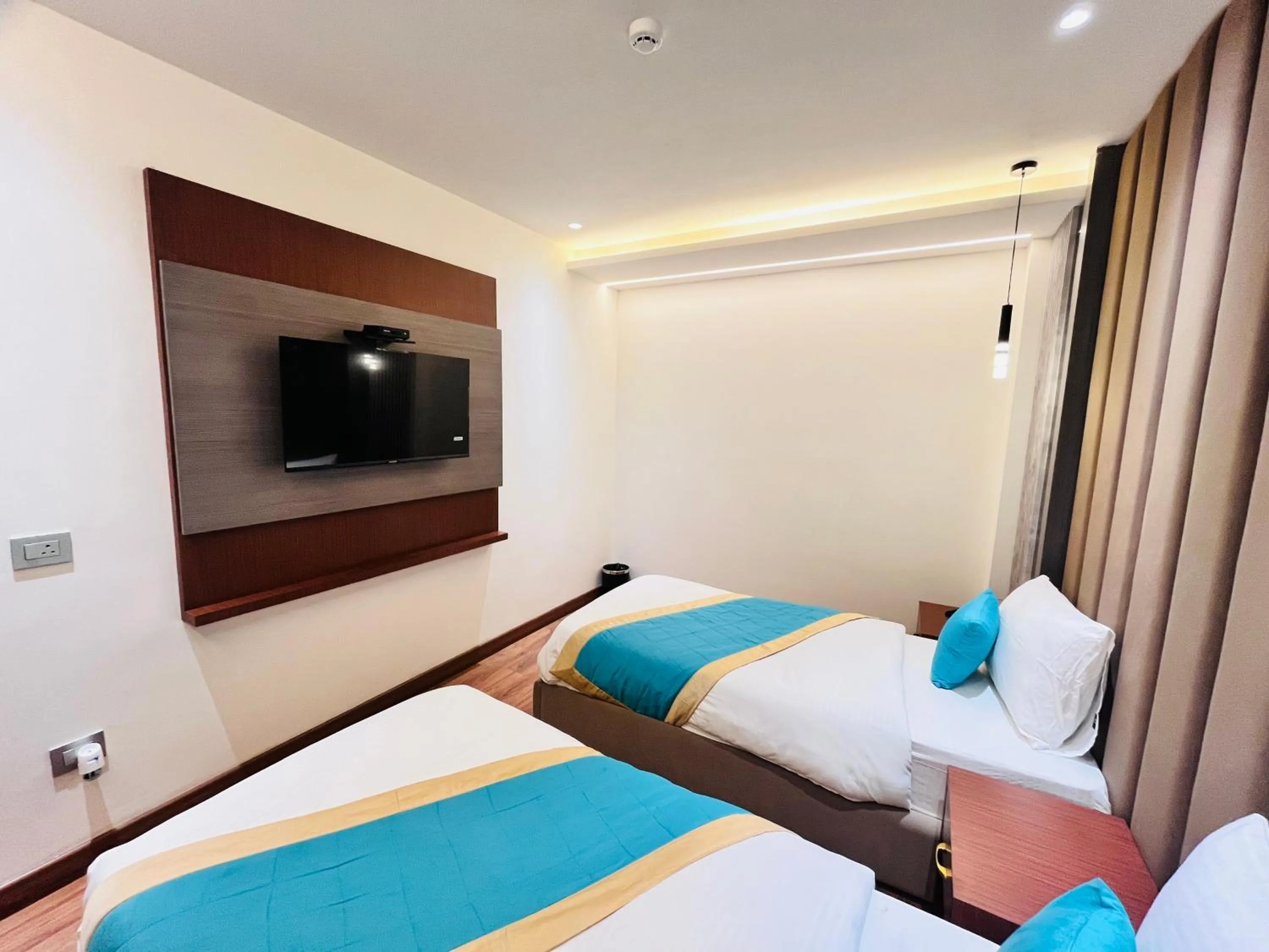 Bed in Western Blu INN