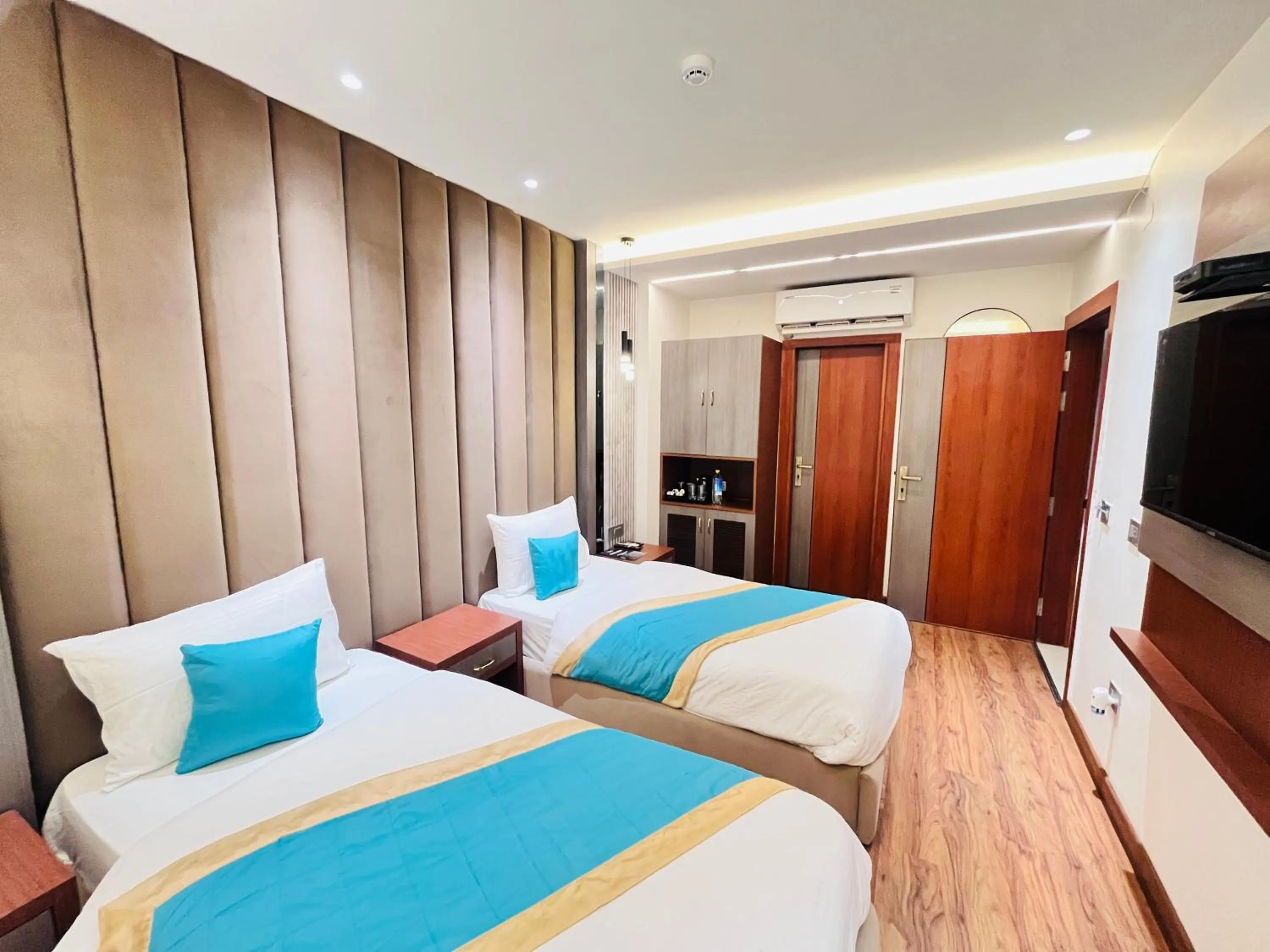 Bed in Western Blu INN