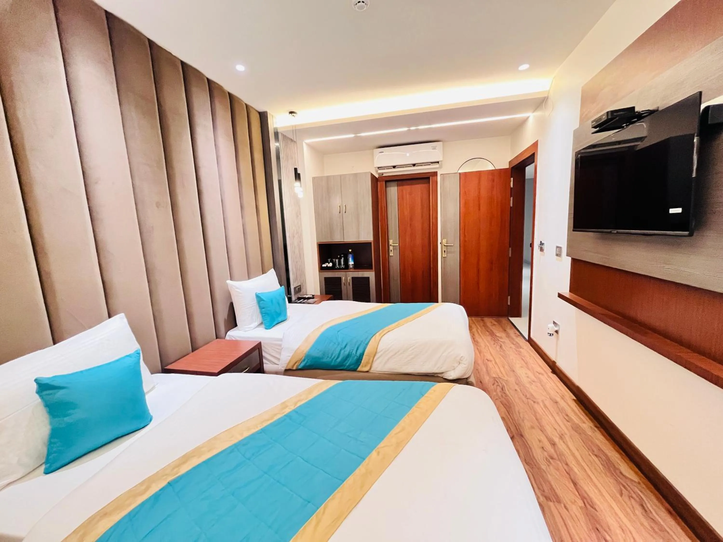 Bed in Western Blu INN