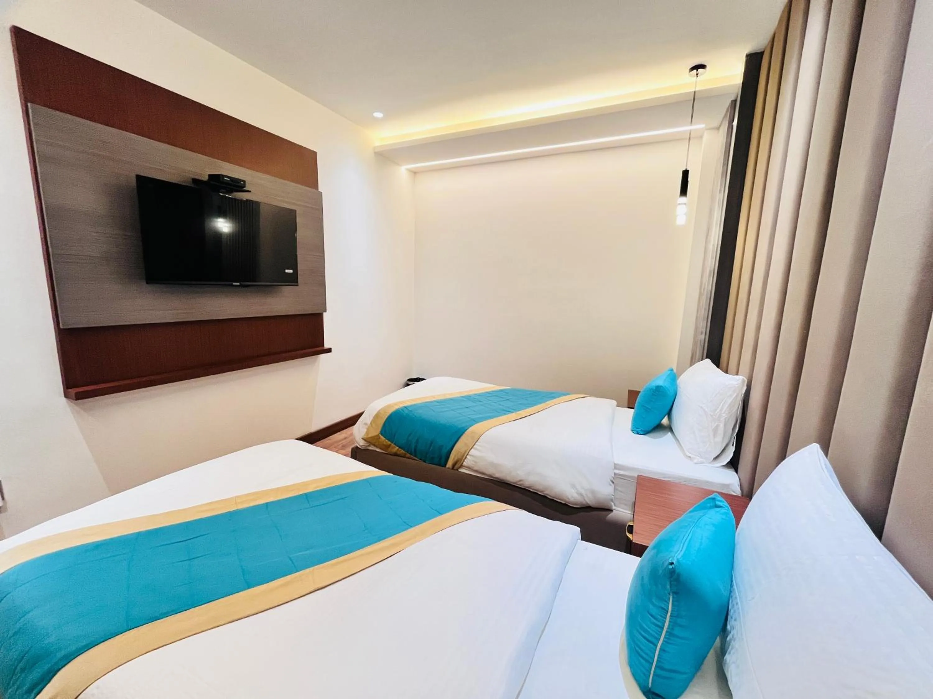 Bed in Western Blu INN