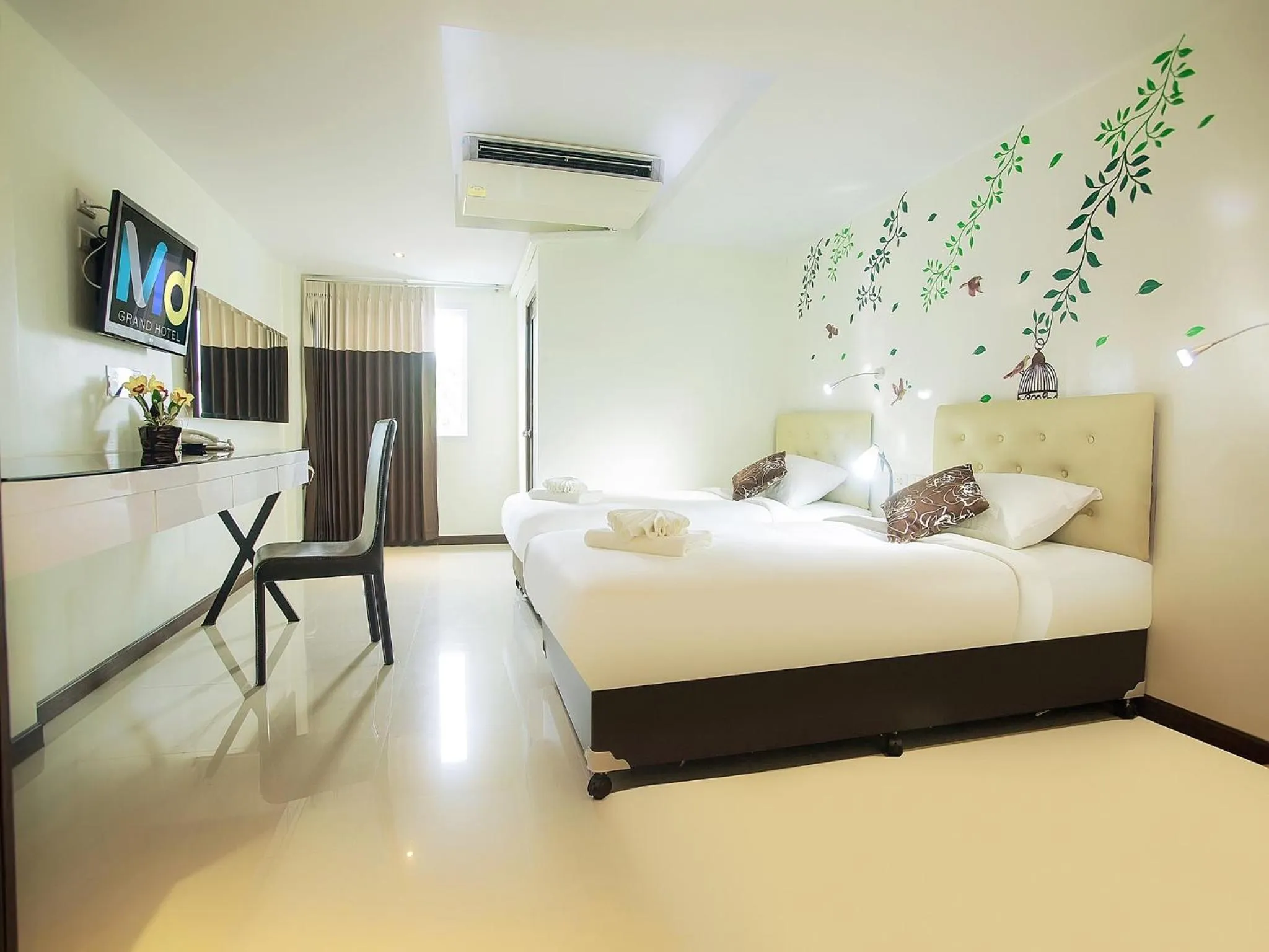 Photo of the whole room in MD Grand Hotel Nakhon