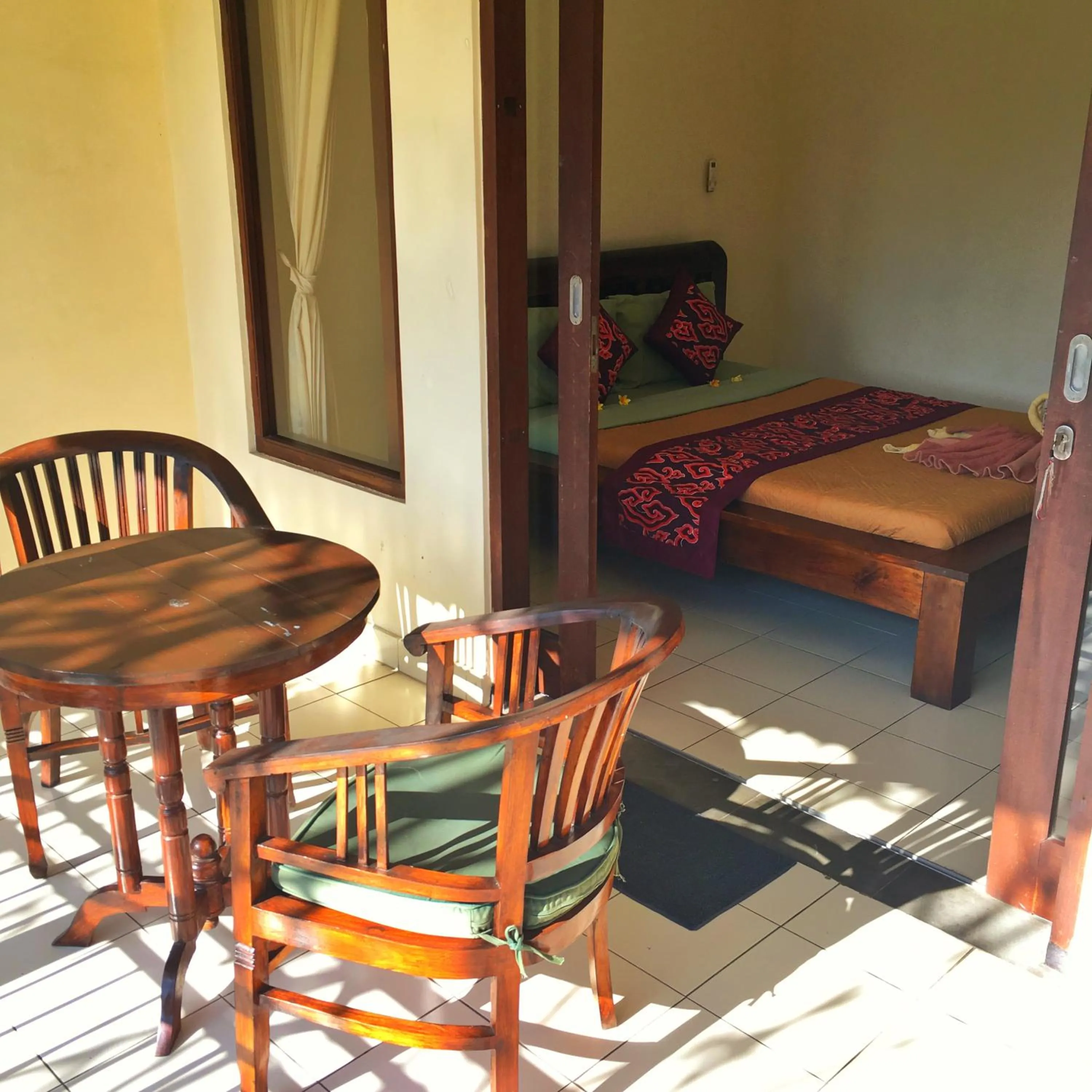 Dining area, Bed in Merthayasa Bungalows