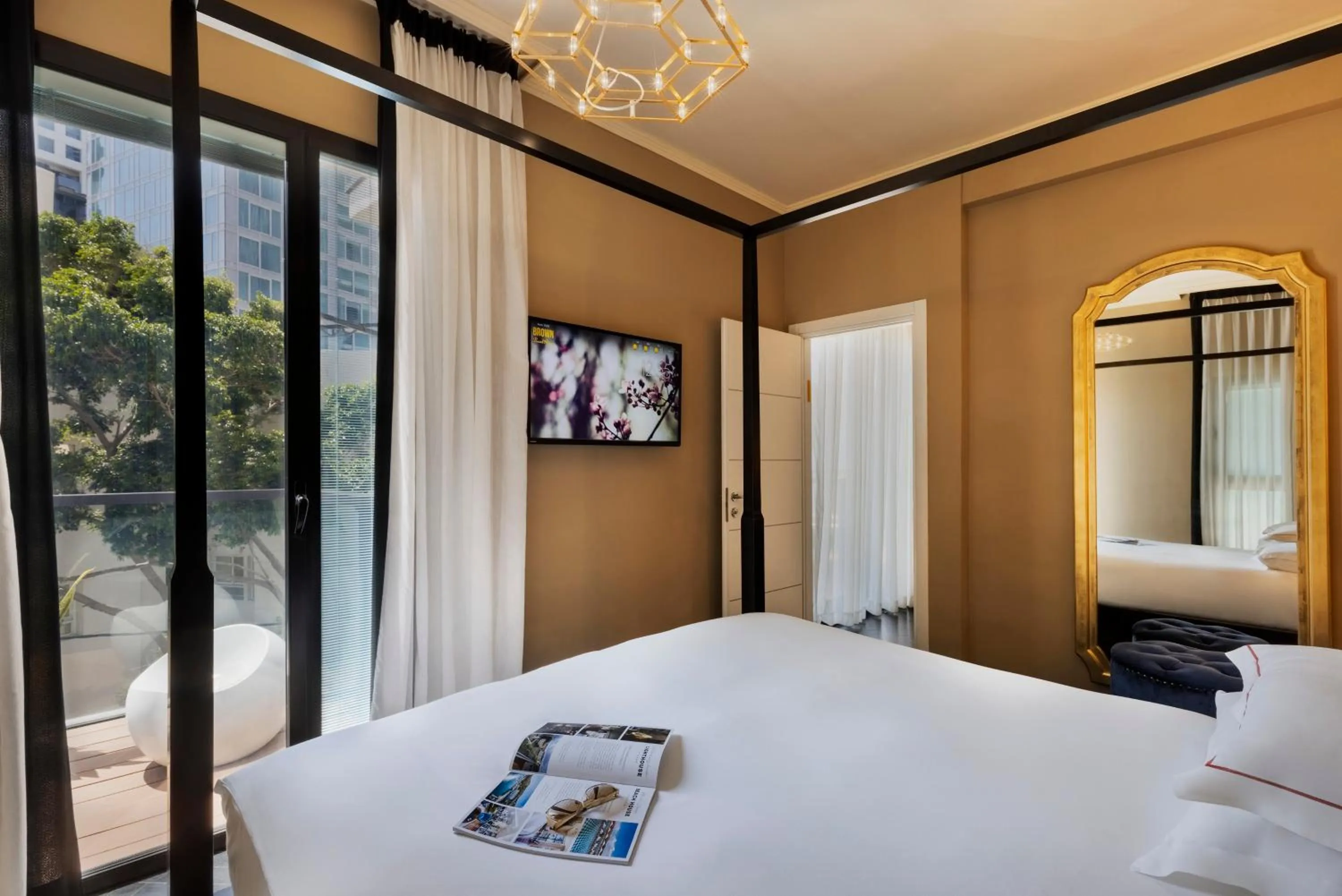 Balcony/Terrace, Bed in Brown Beach House Tel-Aviv, a member of Brown Hotels