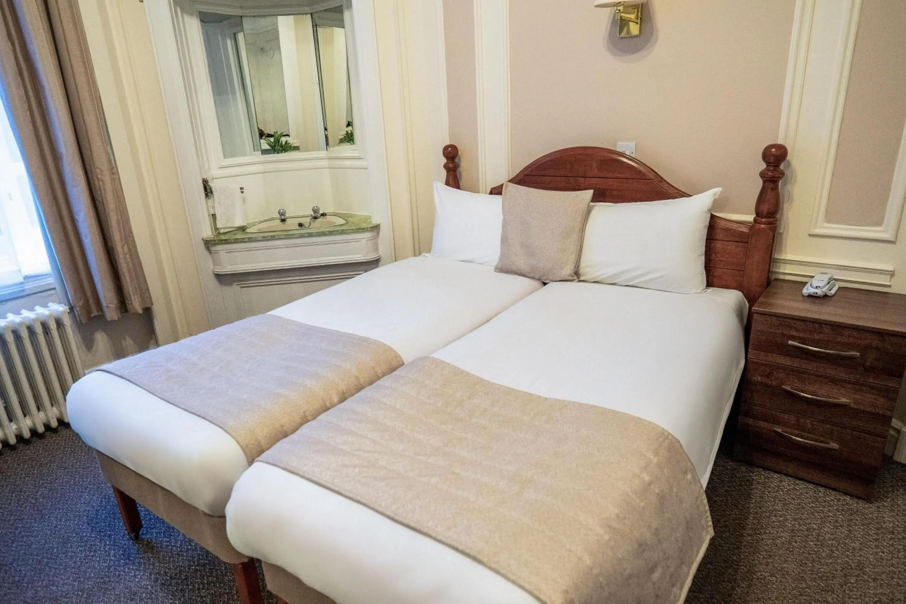 Bed in Adelphi Hotel