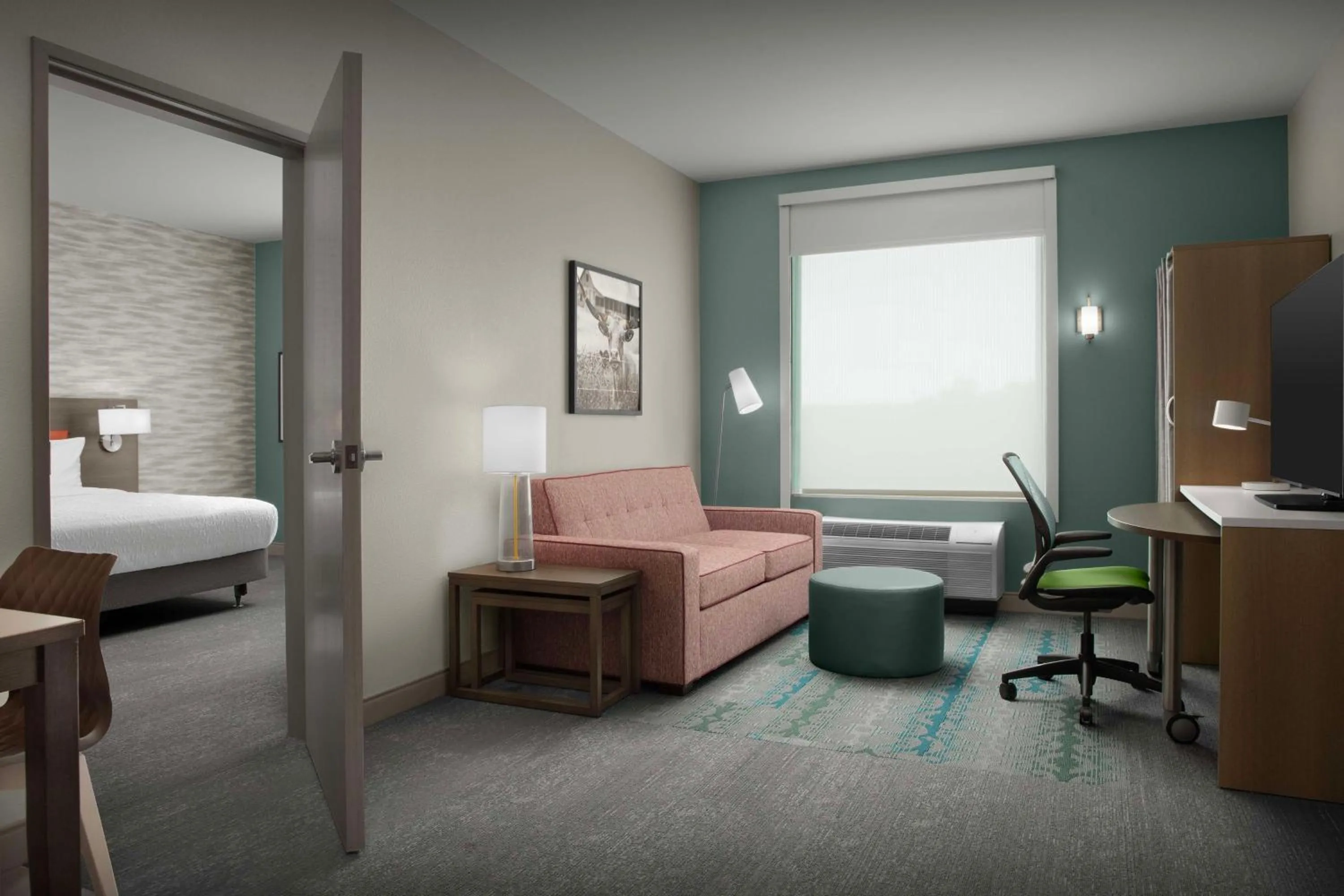 Living room, Bed in Home2 Suites By Hilton Georgetown Austin North