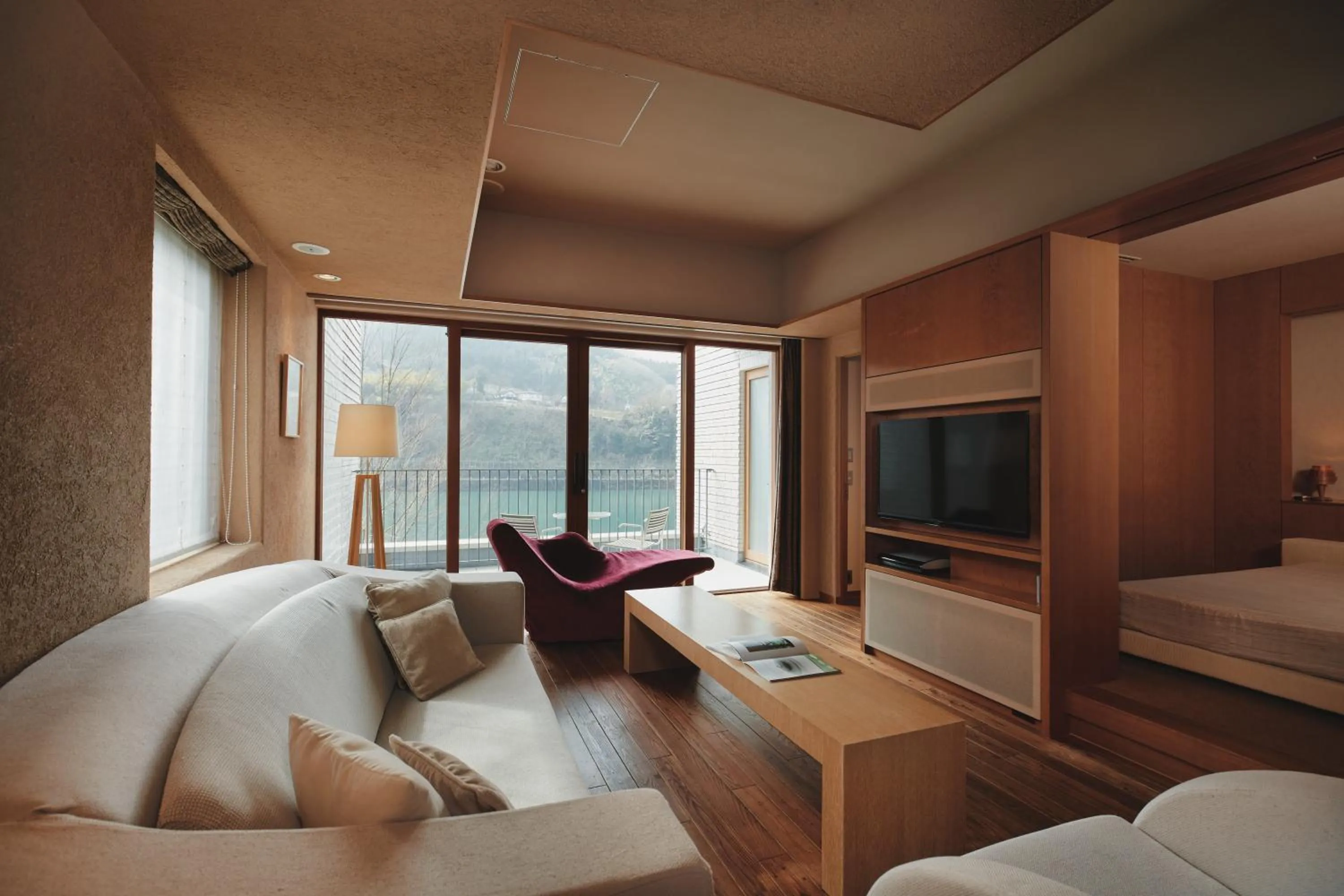 Living room, Bed in River Retreat Garaku