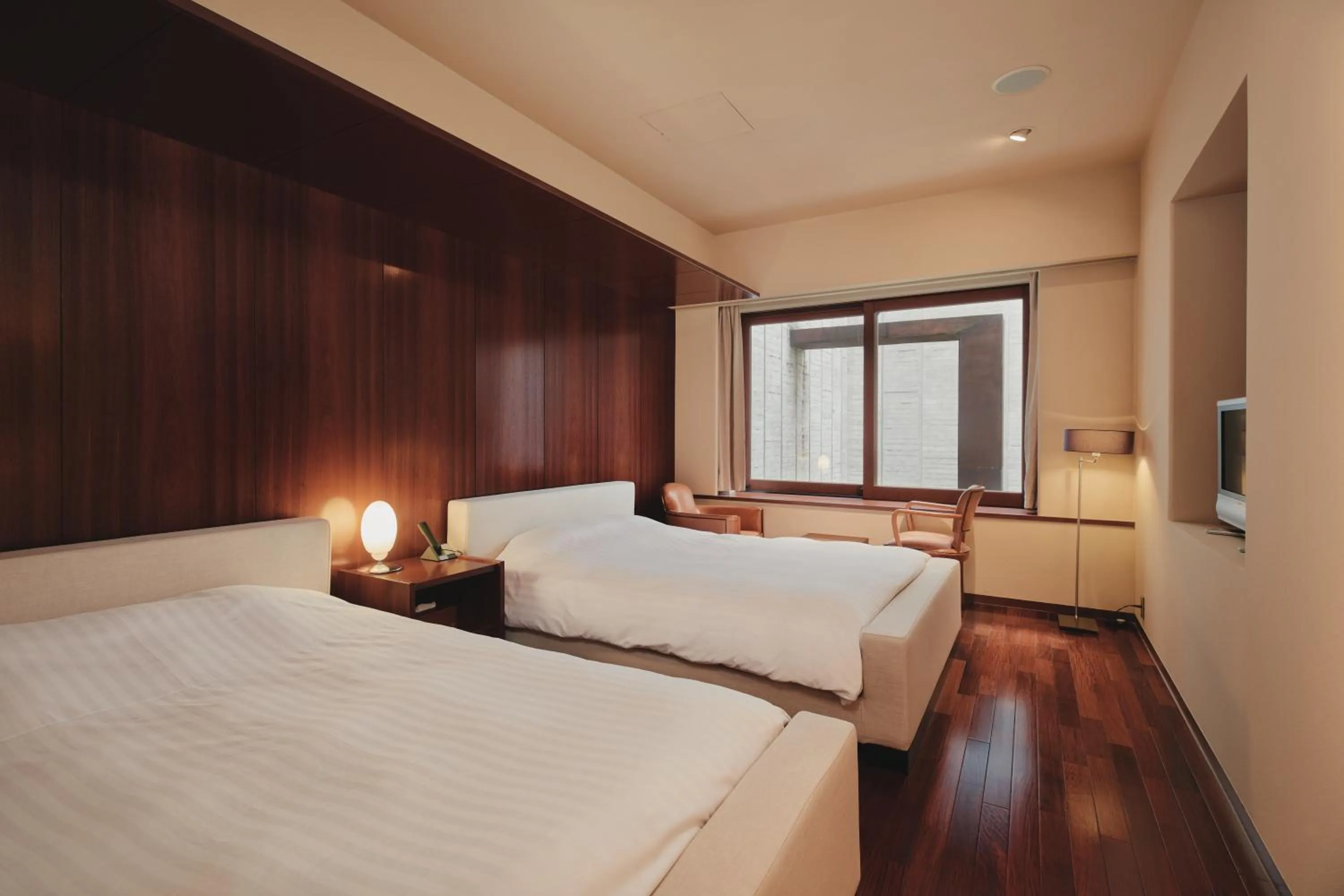 Photo of the whole room, Bed in River Retreat Garaku