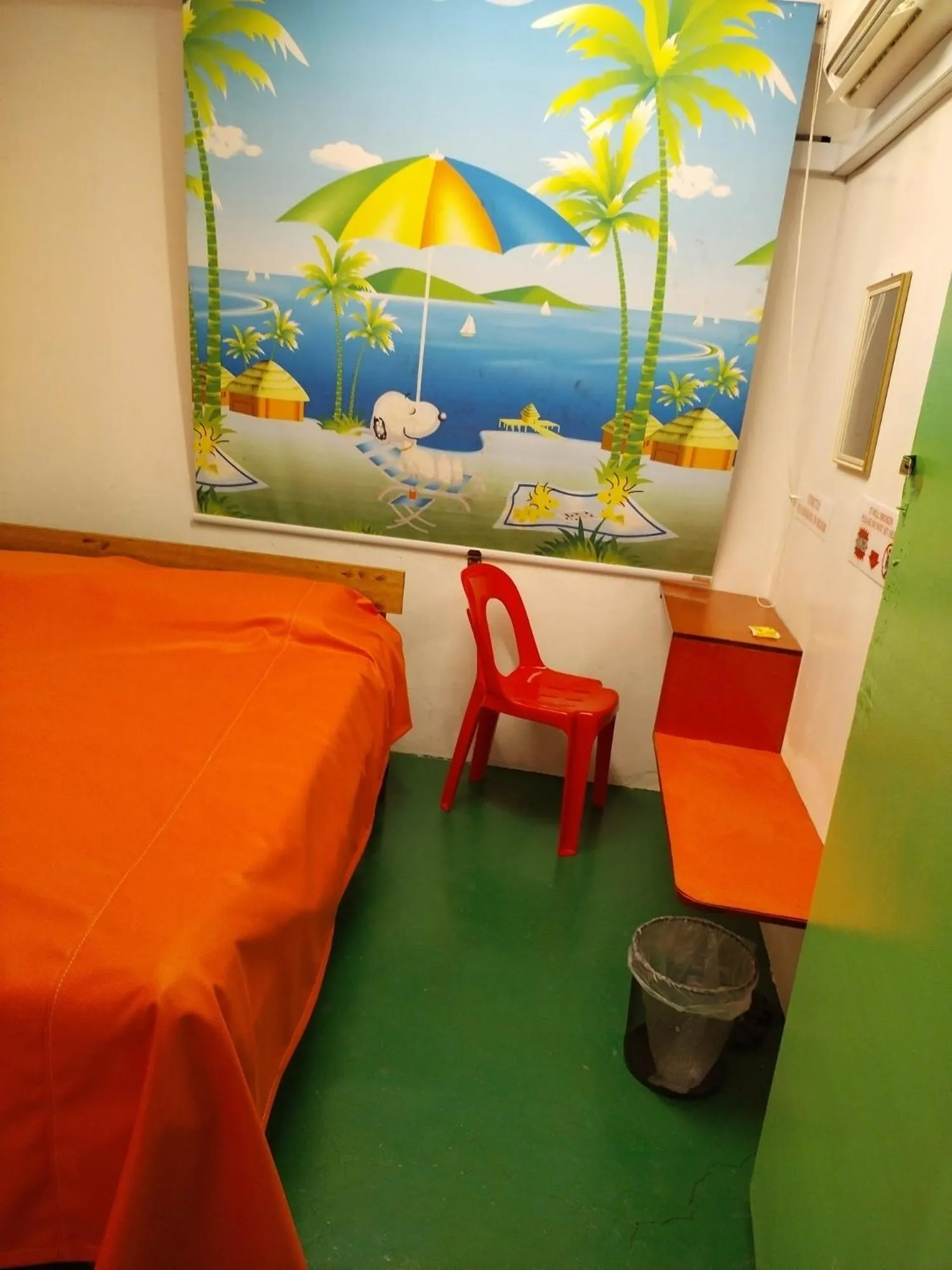 Photo of the whole room, Bed in WISMA ORCHID HOMESTAY Tuaran