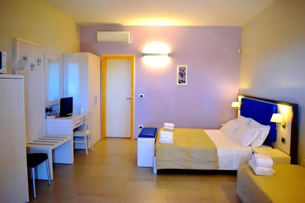 Deluxe Quadruple Room in Tenuta Espada Luxury Residence Deluxe Quadruple Room in Tenuta Espada Luxury Residence