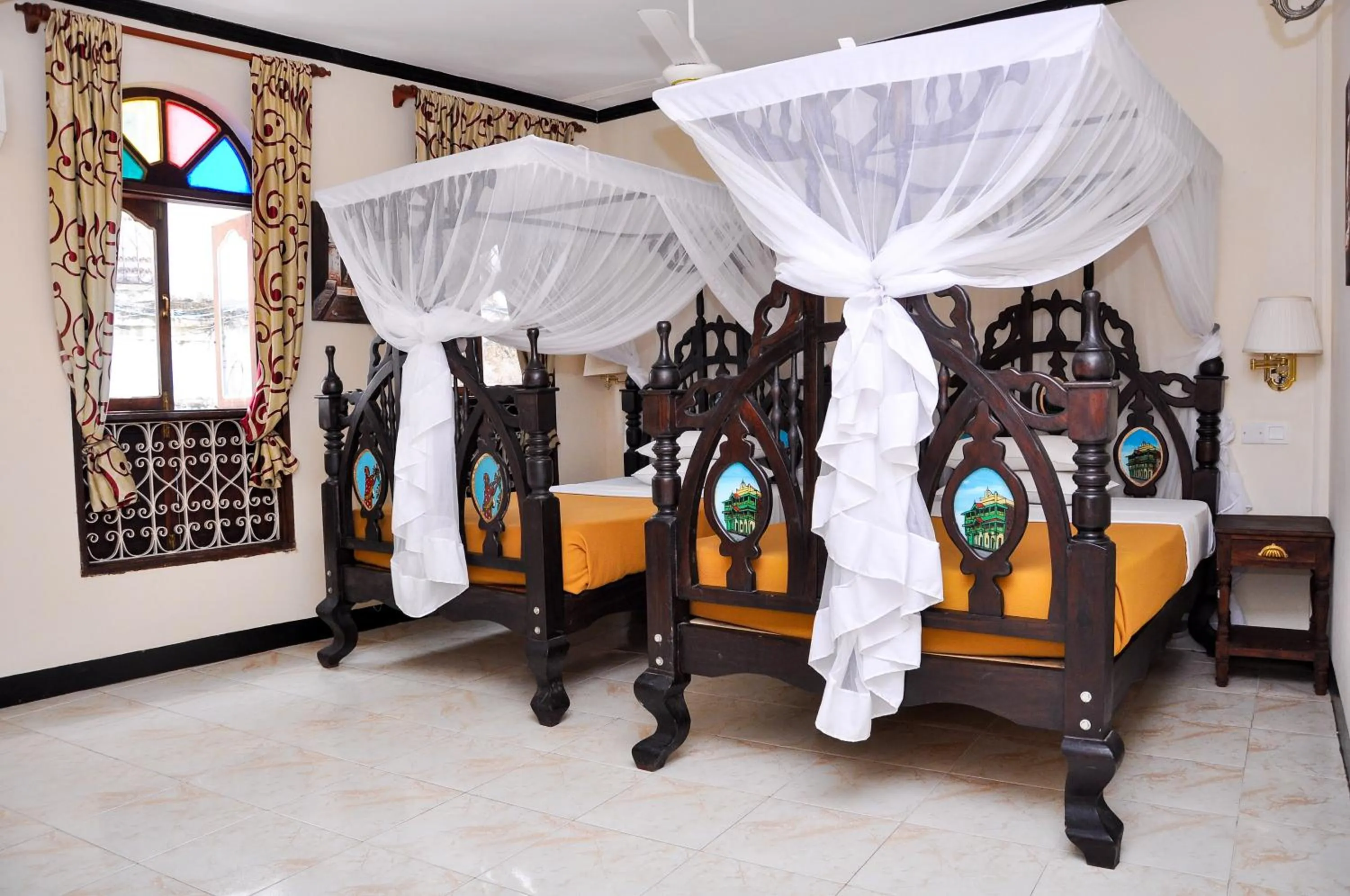 Bed in Forodhani Park Hotel