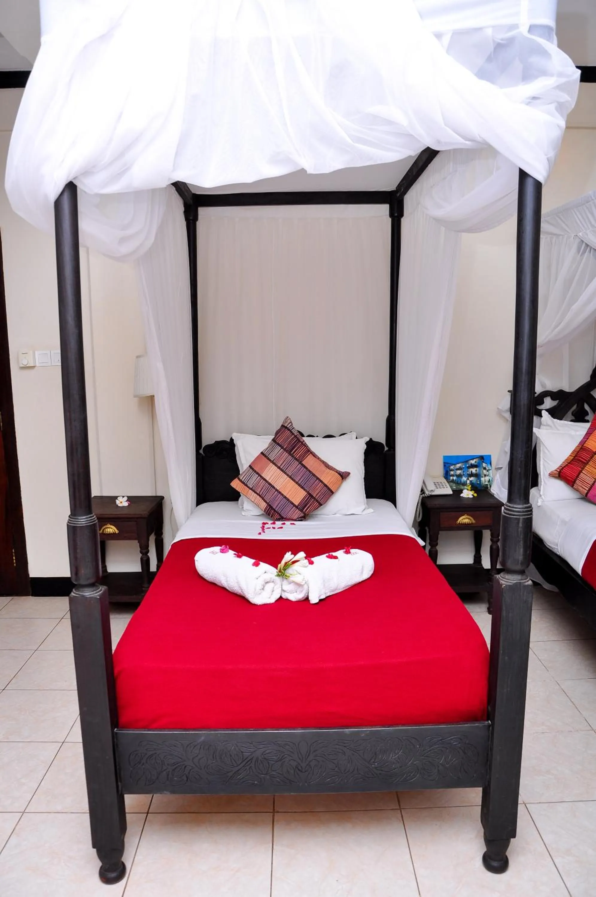 Bed in Forodhani Park Hotel
