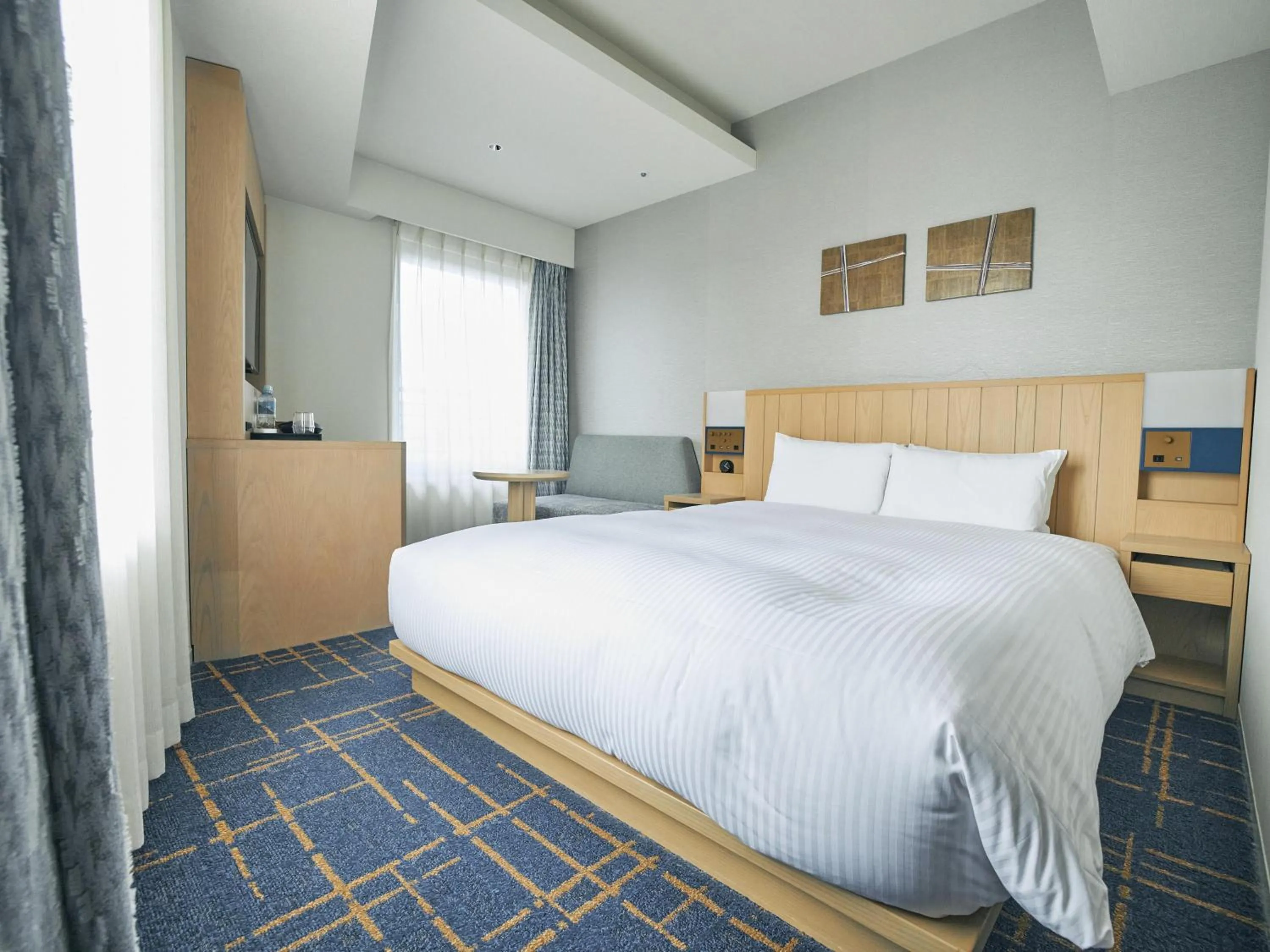 Bed in Hotel Traveltine Kyoto Kiyamachi