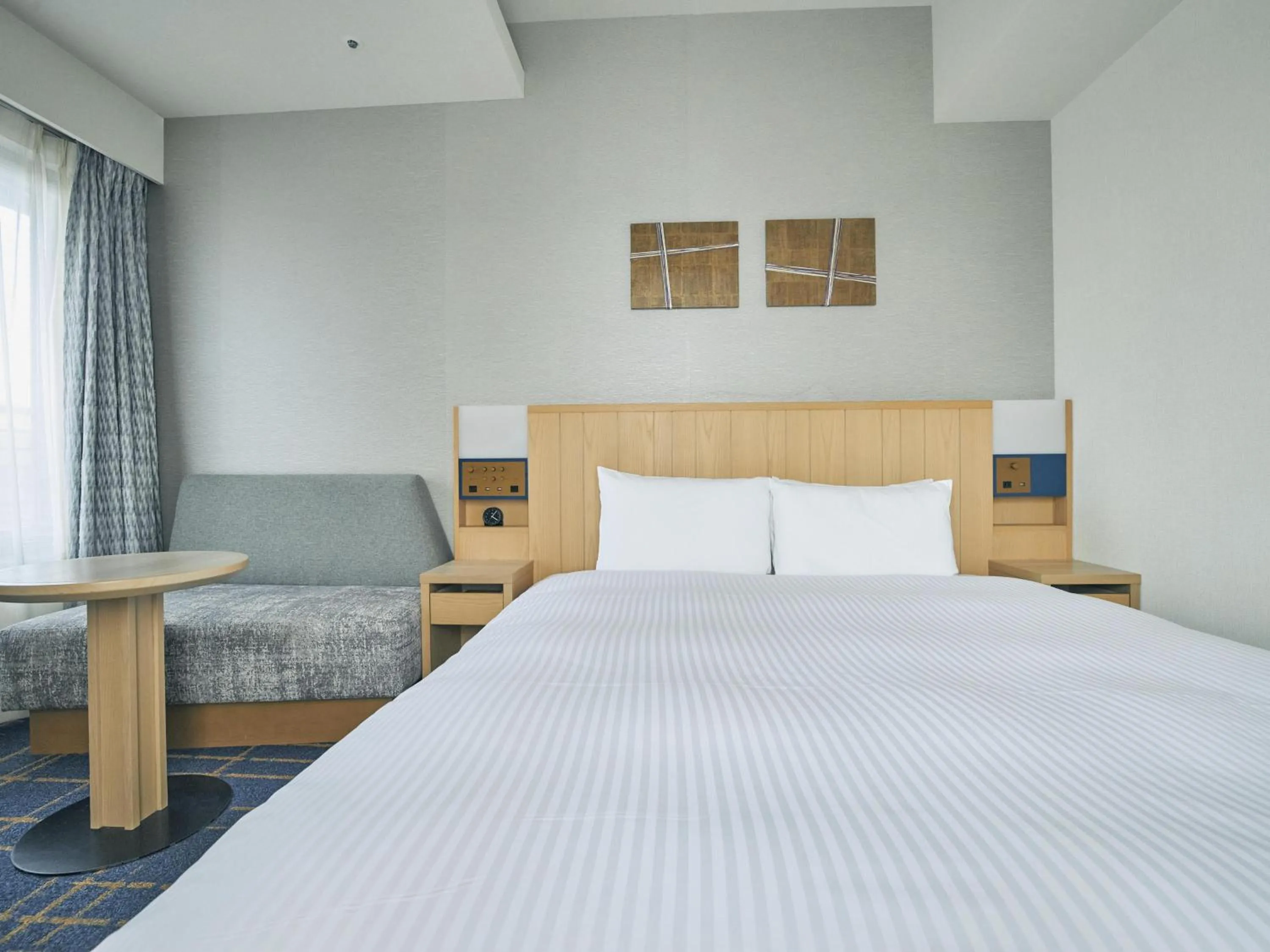 Bed in Hotel Traveltine Kyoto Kiyamachi